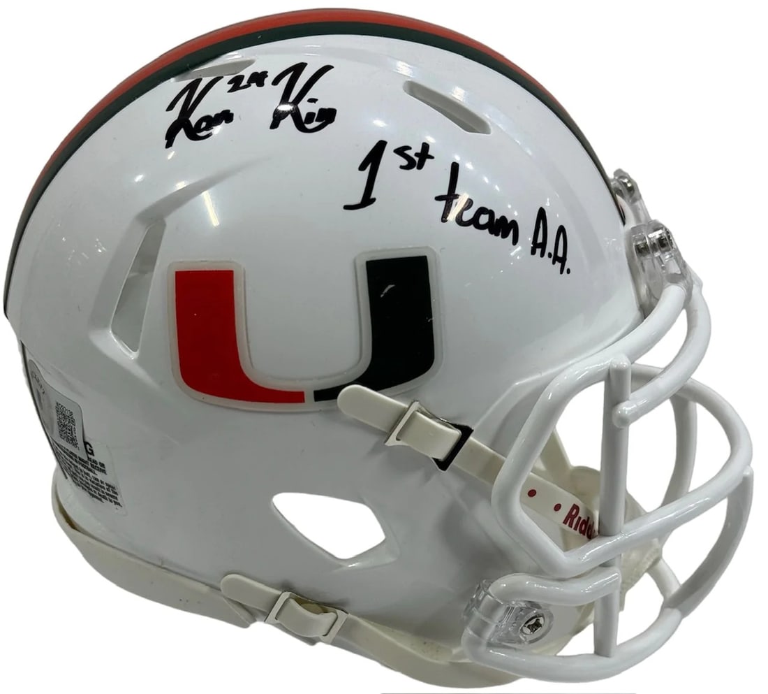Kam Kinchens Autographed University of Miami Hurricanes Speed Mini Helmet (Becke: Kam Kinchens Autographed University of Miami Hurricanes Speed Mini Helmet (Becke Signed in black sharpie across the side of the helmet with inscription "1st Team A.A," Kam Kinchens' autograph adds a u
