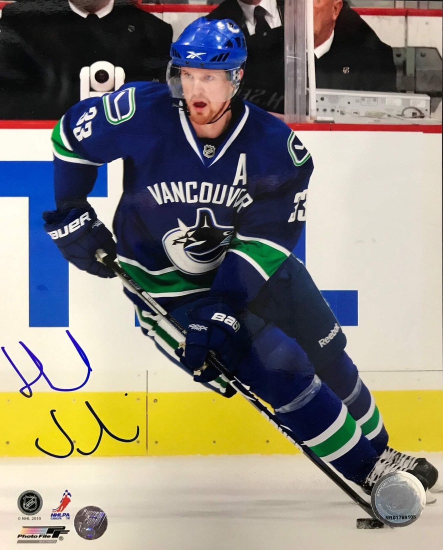 Henrik Sedin Autographed 8x10 Photo Vancouver Canucks (Frozen Pond): Henrik Sedin Autographed 8x10 Photo Vancouver Canucks (Frozen Pond) Henrik Sedin's 8x10 photo, signed across the front in blue sharpie, offers a unique glimpse into the life and career of one of