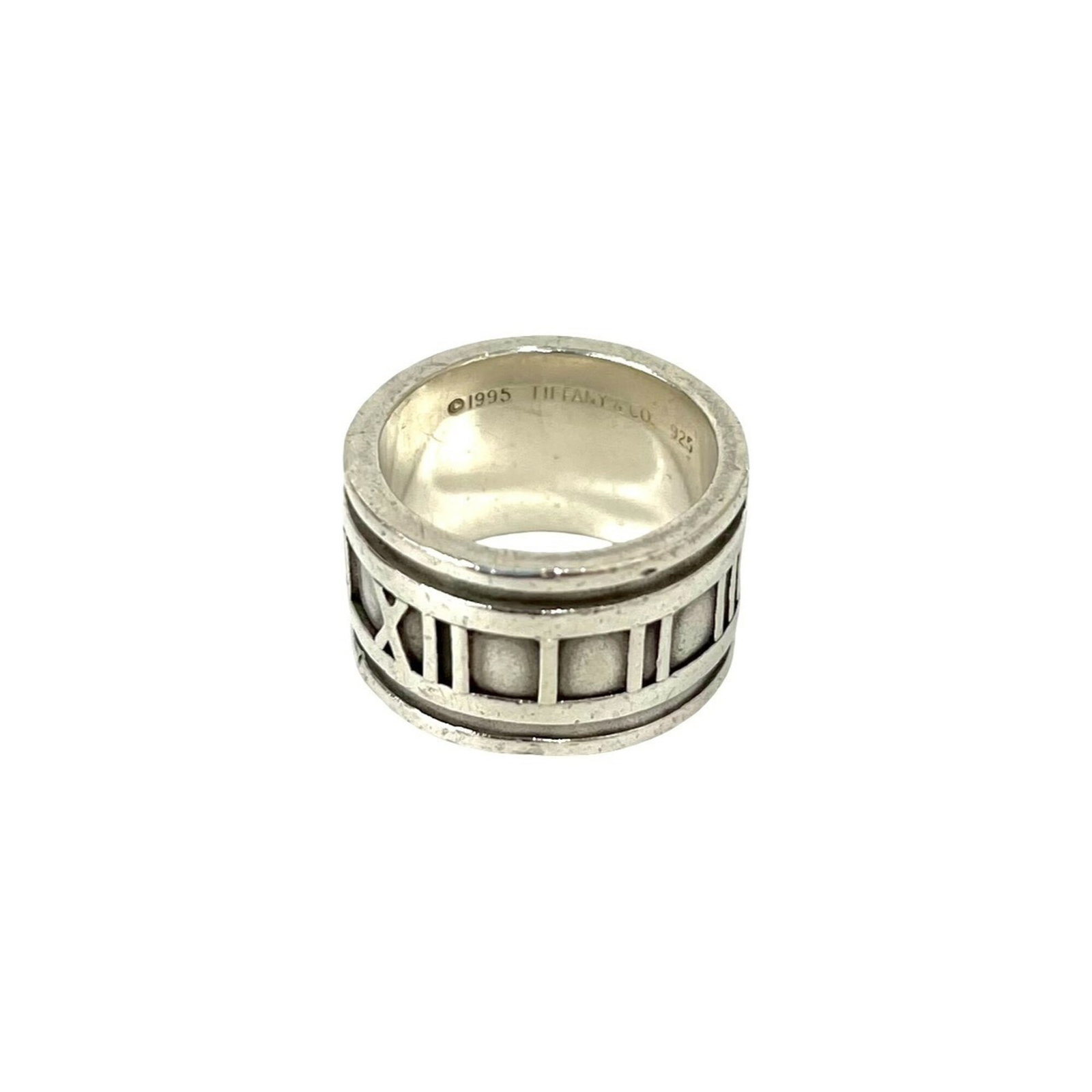 Tiffany Band Ring Silver 925: Tiffany Band Ring Silver 925 Silver band ring from Tiffany featuring 925 sterling silver material, available in US size 4.5 and Japanese size 8. This simple yet elegant design showcases the timeless