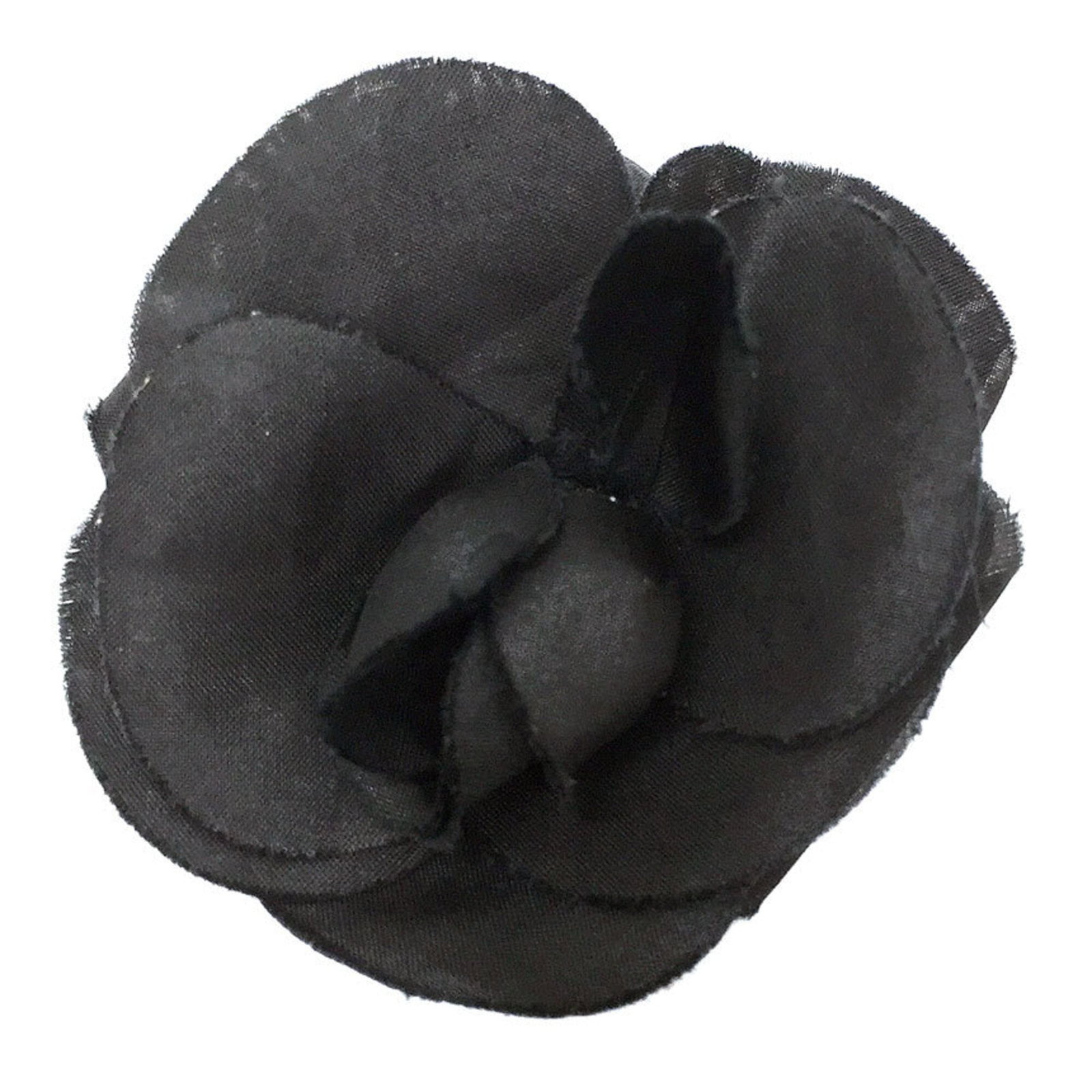 Corsage Leather Chanel: Corsage Leather Chanel Corsage Leather Chanel is a black leather accessory measuring 6.5cm x 6.5cm / 2.55'' x 2.55''. It bears a signature and is made from high-quality leather, characteristic of the
