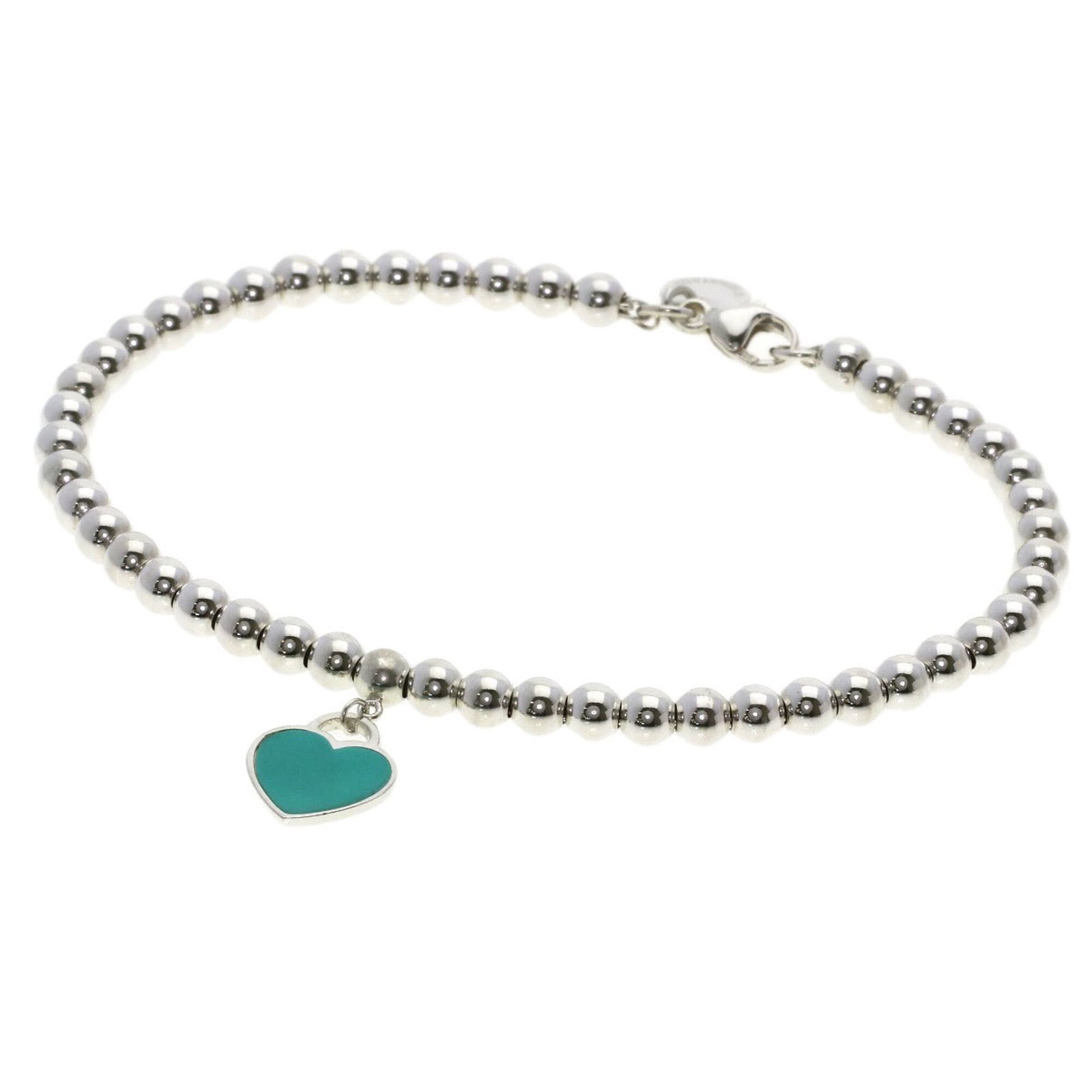 Silver Charm Bracelet by Tiffany: Silver Charm Bracelet by Tiffany Silver Charm Bracelet by Tiffany features a sleek and modern design, with a length of 17.5cm / 6.88''. Made from high-quality silver material, this charm bracelet is