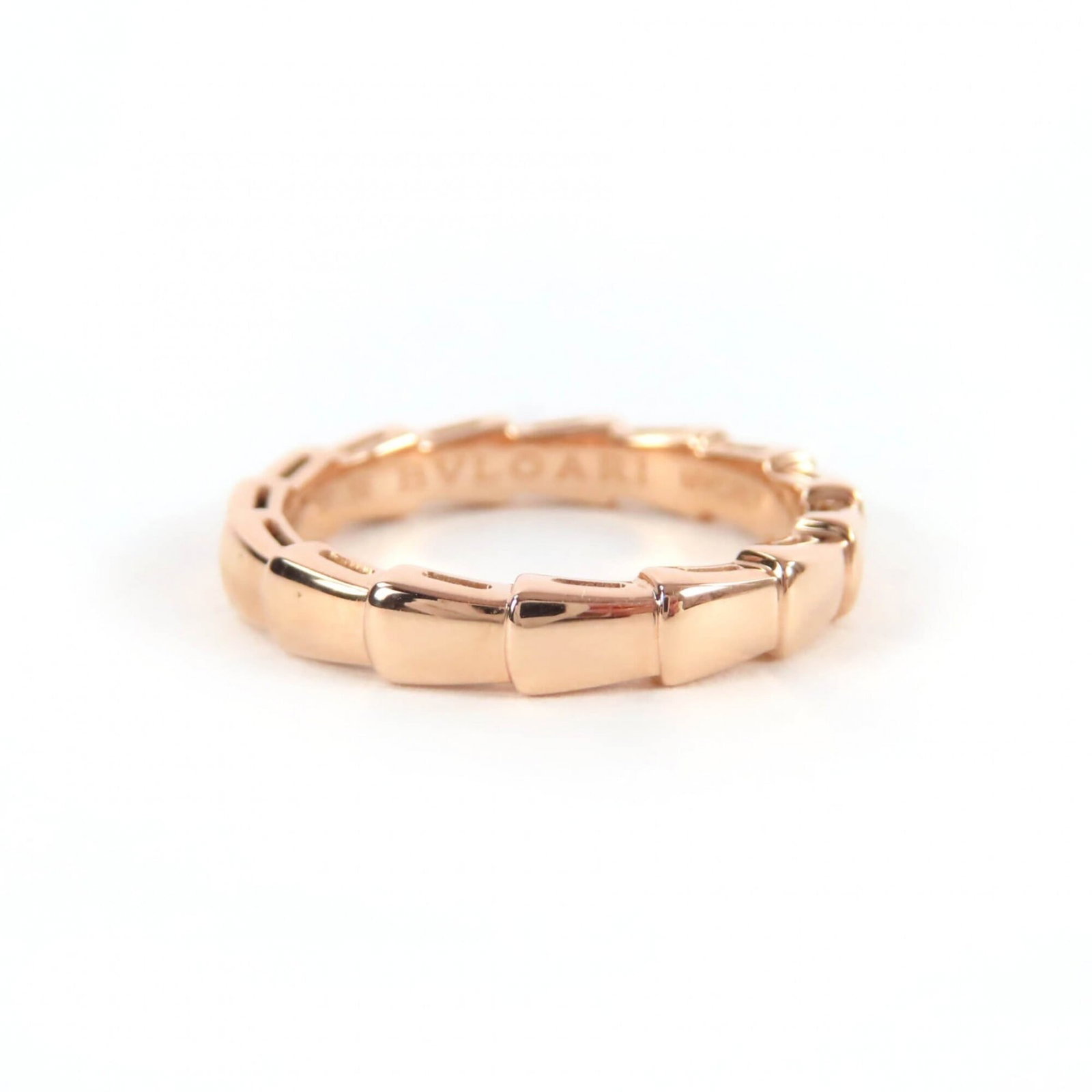 Bvlgari Band Ring Pink Gold (18K): Bvlgari Band Ring Pink Gold (18K) Pink gold (18K) band ring from Bvlgari's Serpenti line, crafted with 4mm width and weighing 4.48g / 0.15oz, available in US size 8 and JP size 16. This elegant piece