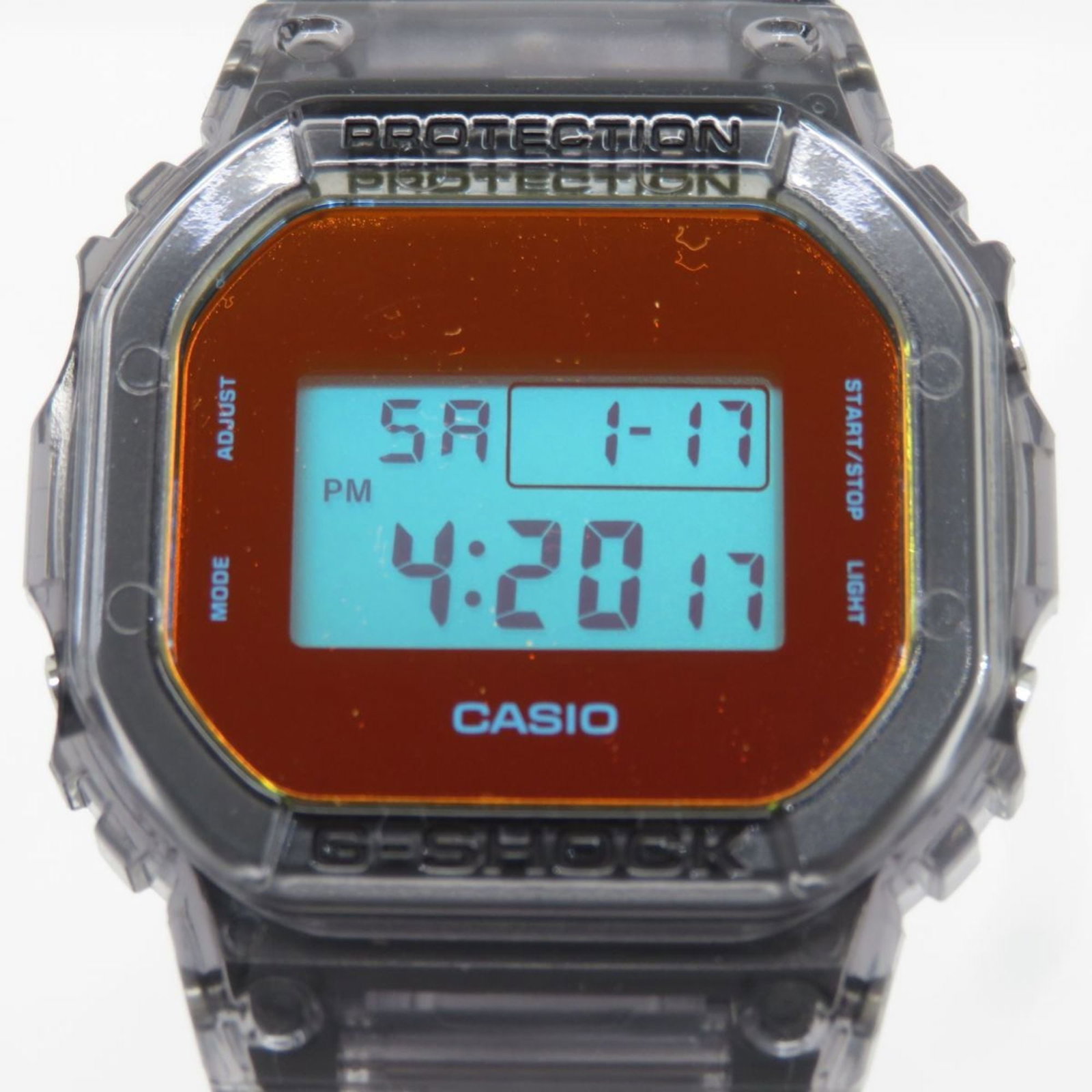 Casio Wristwatch: Casio Wristwatch 42.8mm stainless steel watch with signature, bearing the Casio DW-5600TLS-8JF model number. This wristwatch features a classic design and adjustable strap to fit wrists between