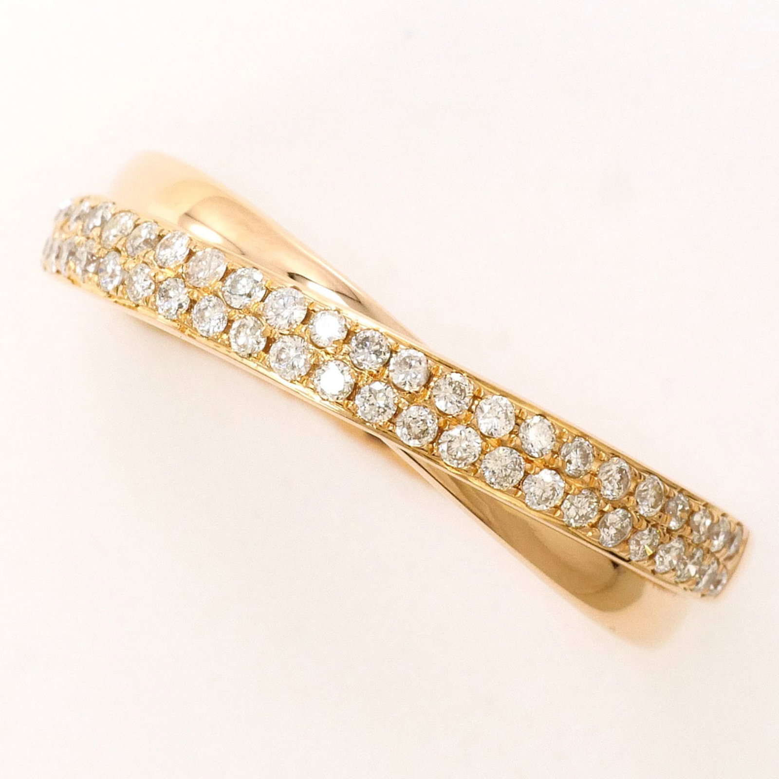 Pink Gold 18K Unbranded Band Ring: Pink Gold 18K Unbranded Band Ring Pink gold 18K band ring with a diamond stone weighing 0.30 carats, set in a sturdy pink gold (18K) metal construction, measuring 4mm in width and available in US