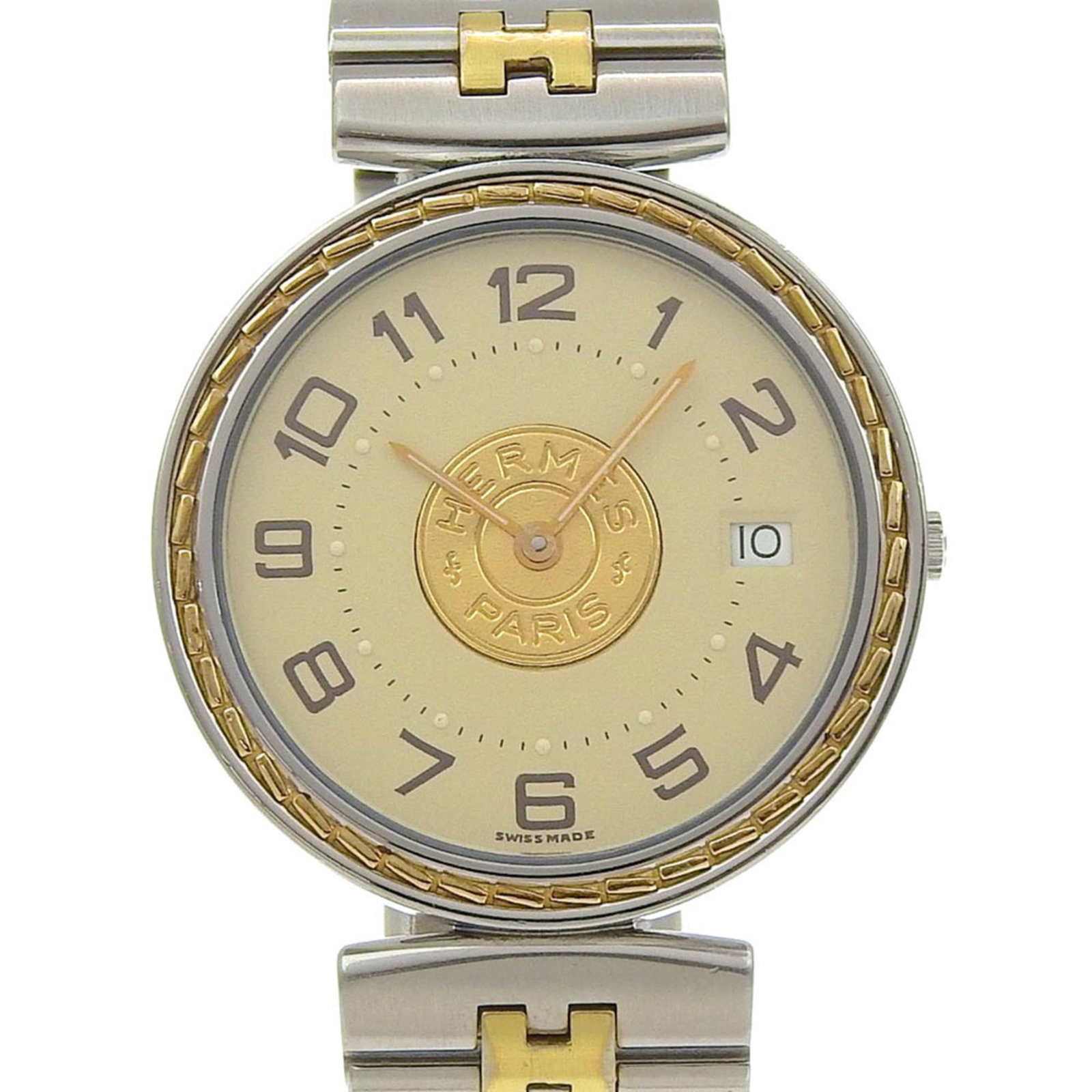 Hermes Wristwatch: Hermes Wristwatch Stainless steel case and band, the Hermes wristwatch boasts a sleek design with an ivory dial. Measuring 32mm in diameter, it's suitable for wrists up to 16cm in circumference. This