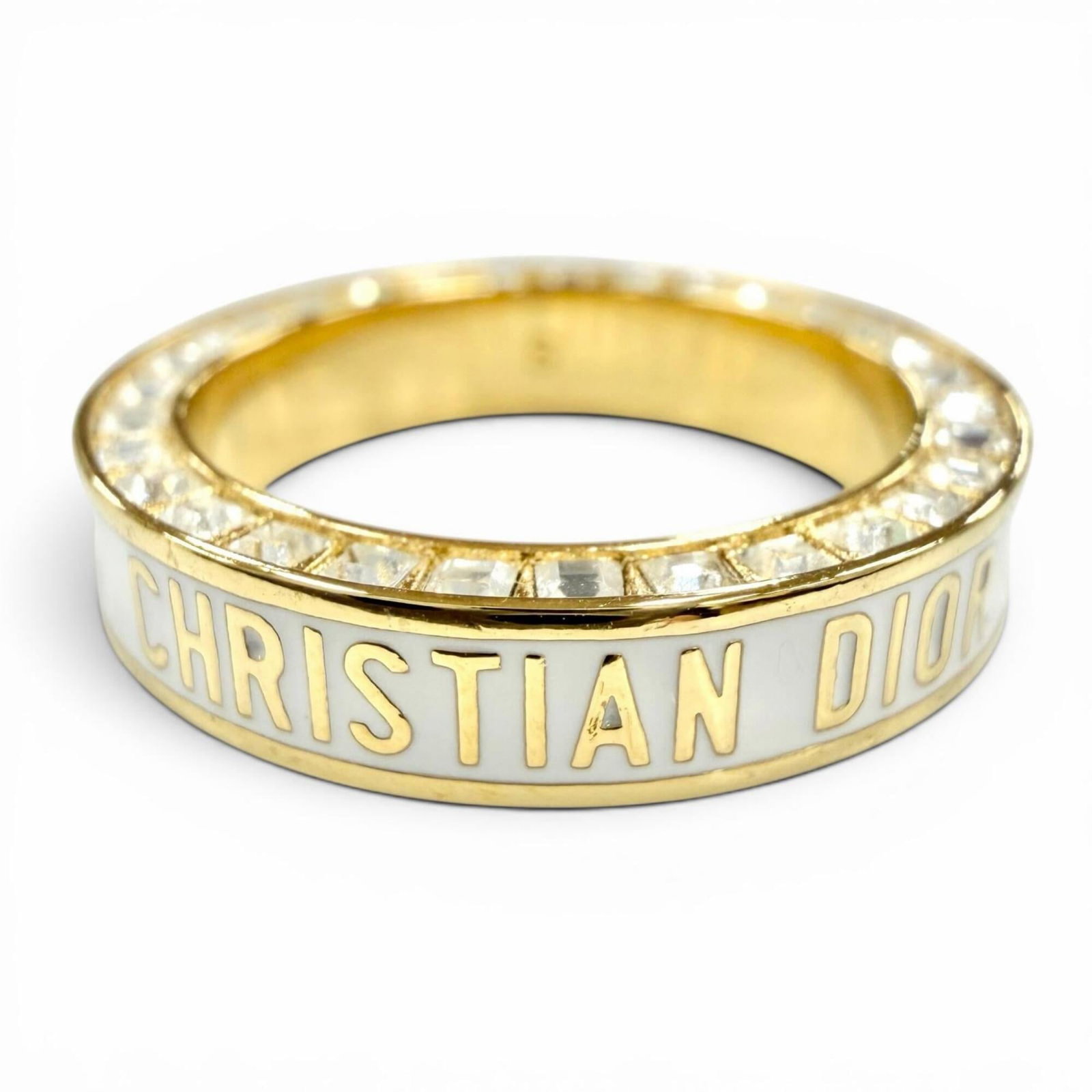 Dior Ring Christian Band: Dior Ring Christian Band Gold and crystal adorn the sleek band ring from Christian Dior, available in US size 5.5 and JP size 10 for a comfortable fit. This elegant piece features a classic design