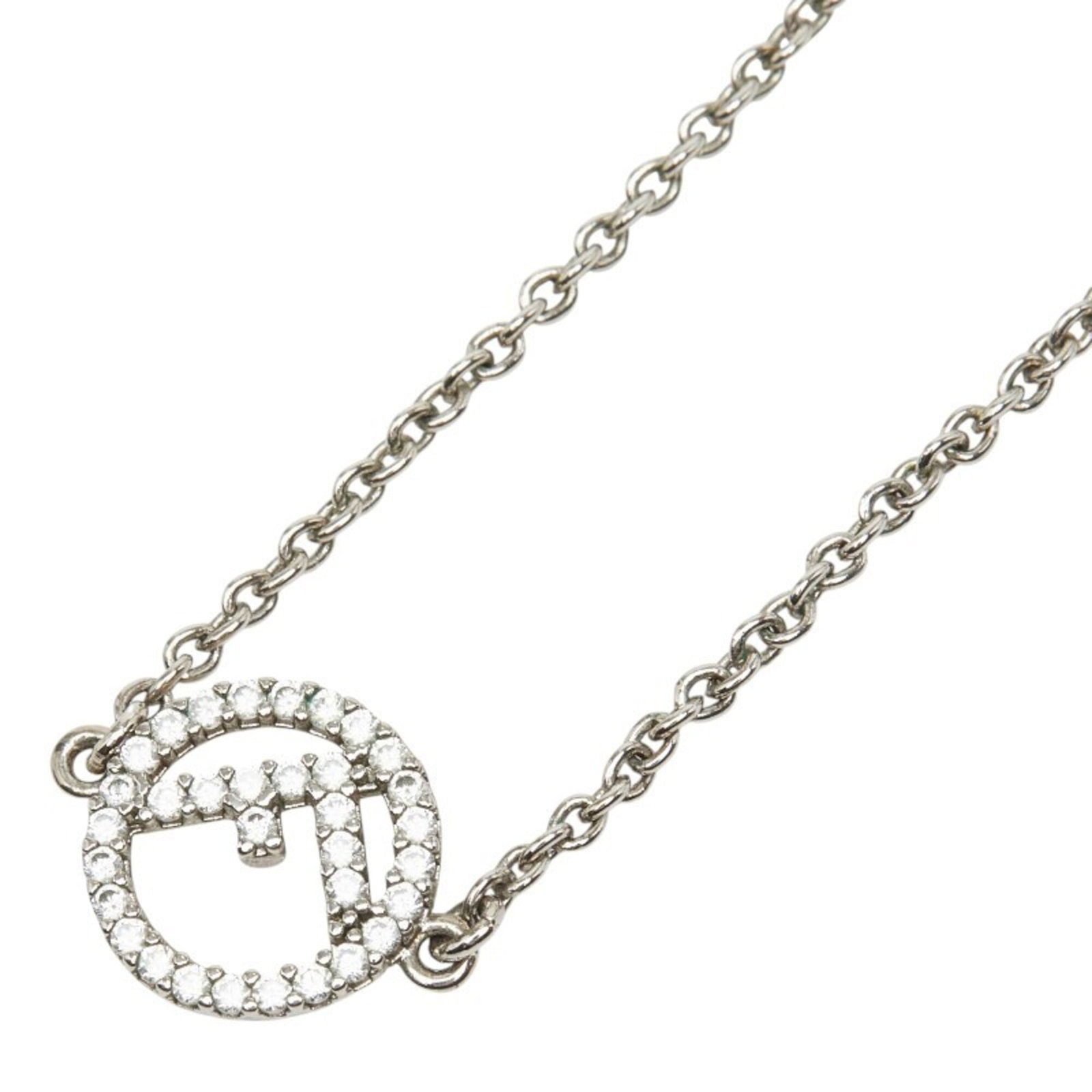 Women's Fendi F Is Cubic Zirconia Metal Logo Silver Necklace: Women's Fendi F Is Cubic Zirconia Metal Logo Silver Necklace The Fendi F Is Cubic Zirconia Metal Logo Silver Necklace boasts a sleek design with a 10.1mm x 14mm cubic zirconia pendant, adding a touch