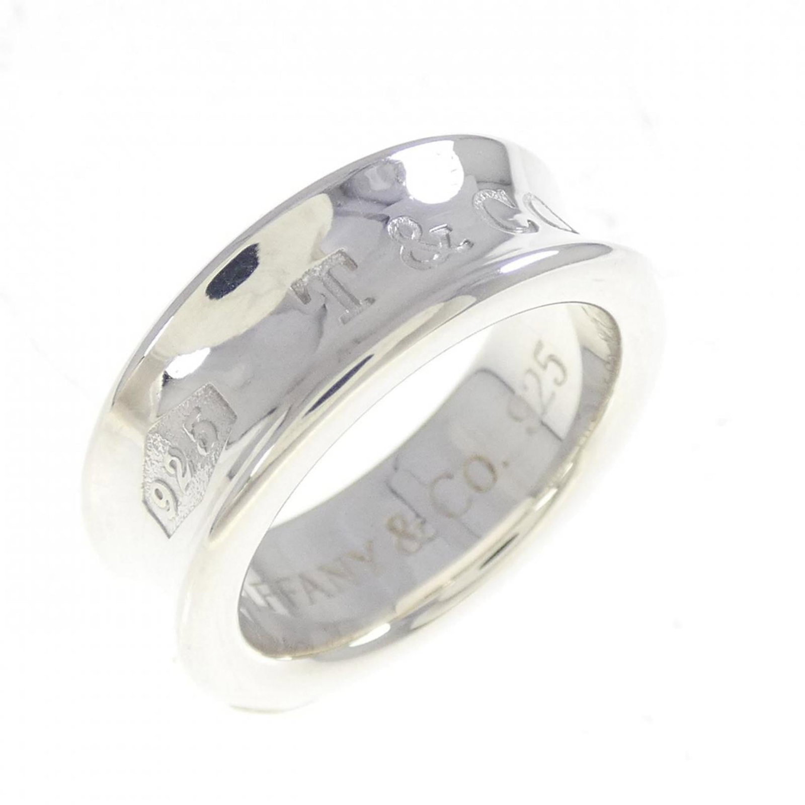 Silver 925 Tiffany Band Ring: Silver 925 Tiffany Band Ring Silver 925 Tiffany Band Ring features a sleek design with a US size 4.5 and JP size 8, offering a comfortable fit for women. The ring's silver 925 material provides