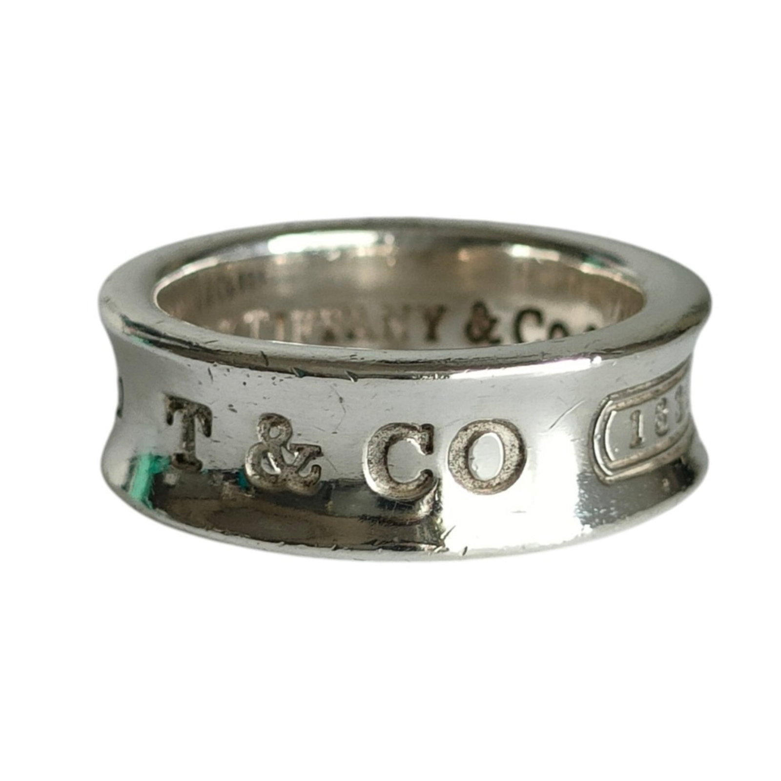 Silver 925 Tiffany Band Ring: Silver 925 Tiffany Band Ring Silver 925 Tiffany Band Ring, featuring a classic design made from high-quality silver alloy. This timeless piece is available in US size 6 and Japanese size 11, suitable
