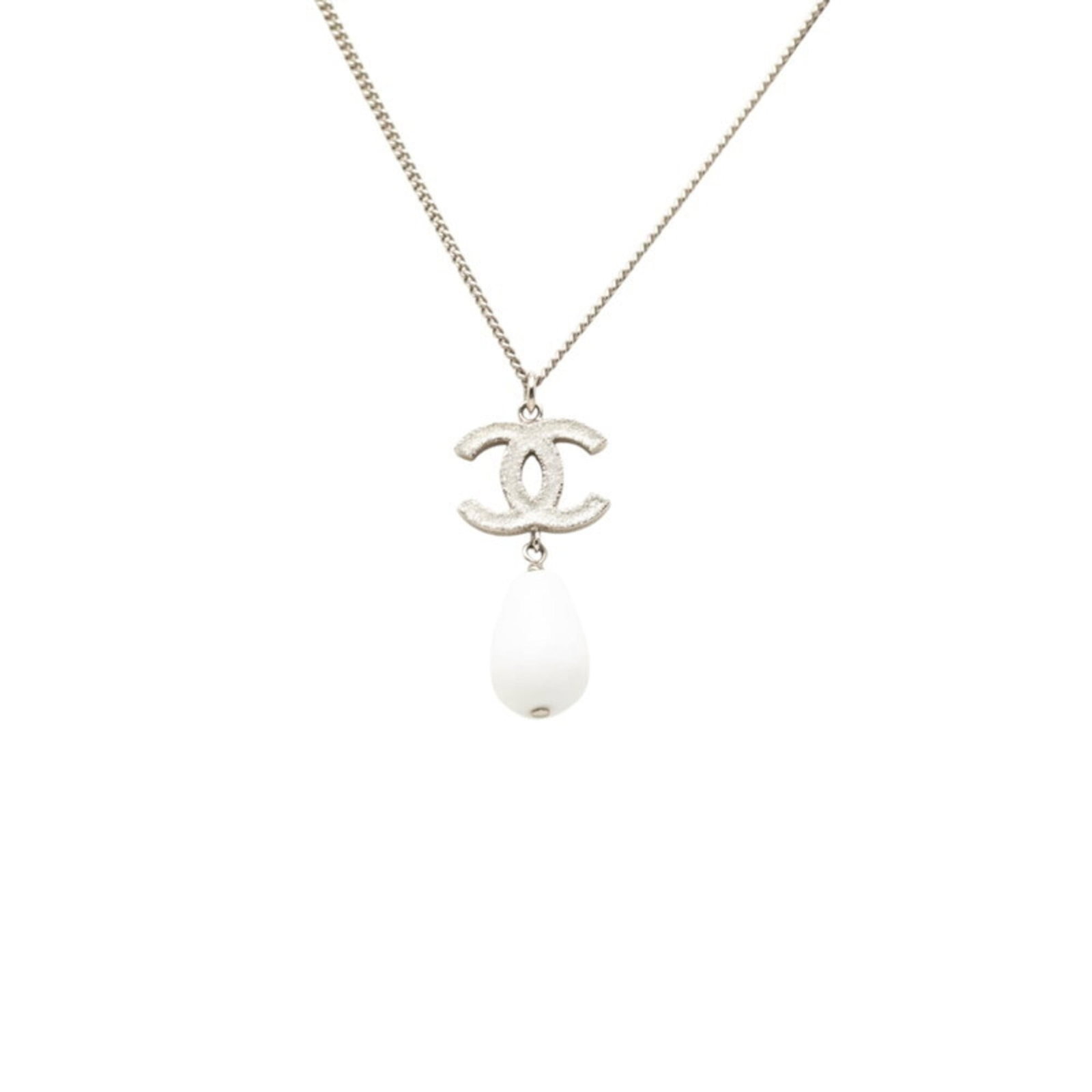 Chanel Women's Silver White Metal Necklace Coco B10A Mark Pendant: Chanel Women's Silver White Metal Necklace Coco B10A Mark Pendant Silver and white metal Chanel necklace with a Coco B10A Mark pendant, featuring a striking design. The necklace measures 61 cm in