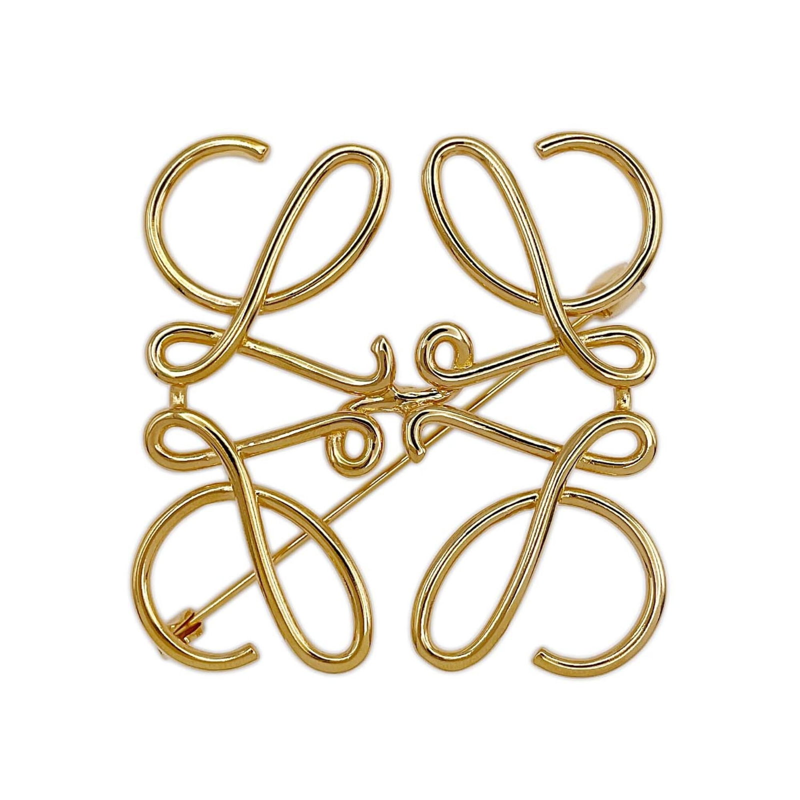 Loewe Brooch Metal: Loewe Brooch Metal Gold Loewe Brooch with Metal Construction. This 5.3cm x 5.3cm gold brooch features metal construction and bears a signature. A stylish accessory for those who appreciate luxury
