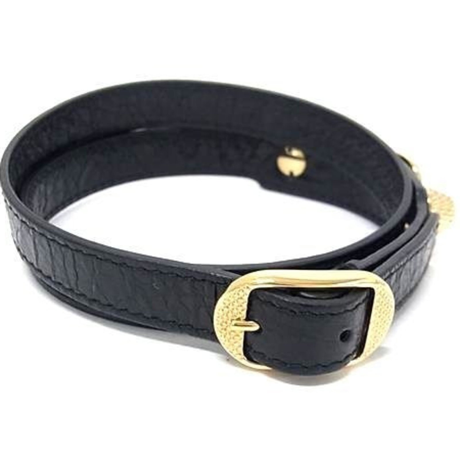 Charm leather bracelet Balenciaga: Charm leather bracelet Balenciaga Black leather charm bracelet from Balenciaga, measuring 59cm in length. This Italian-made accessory features a sleek design and premium leather material. The classic
