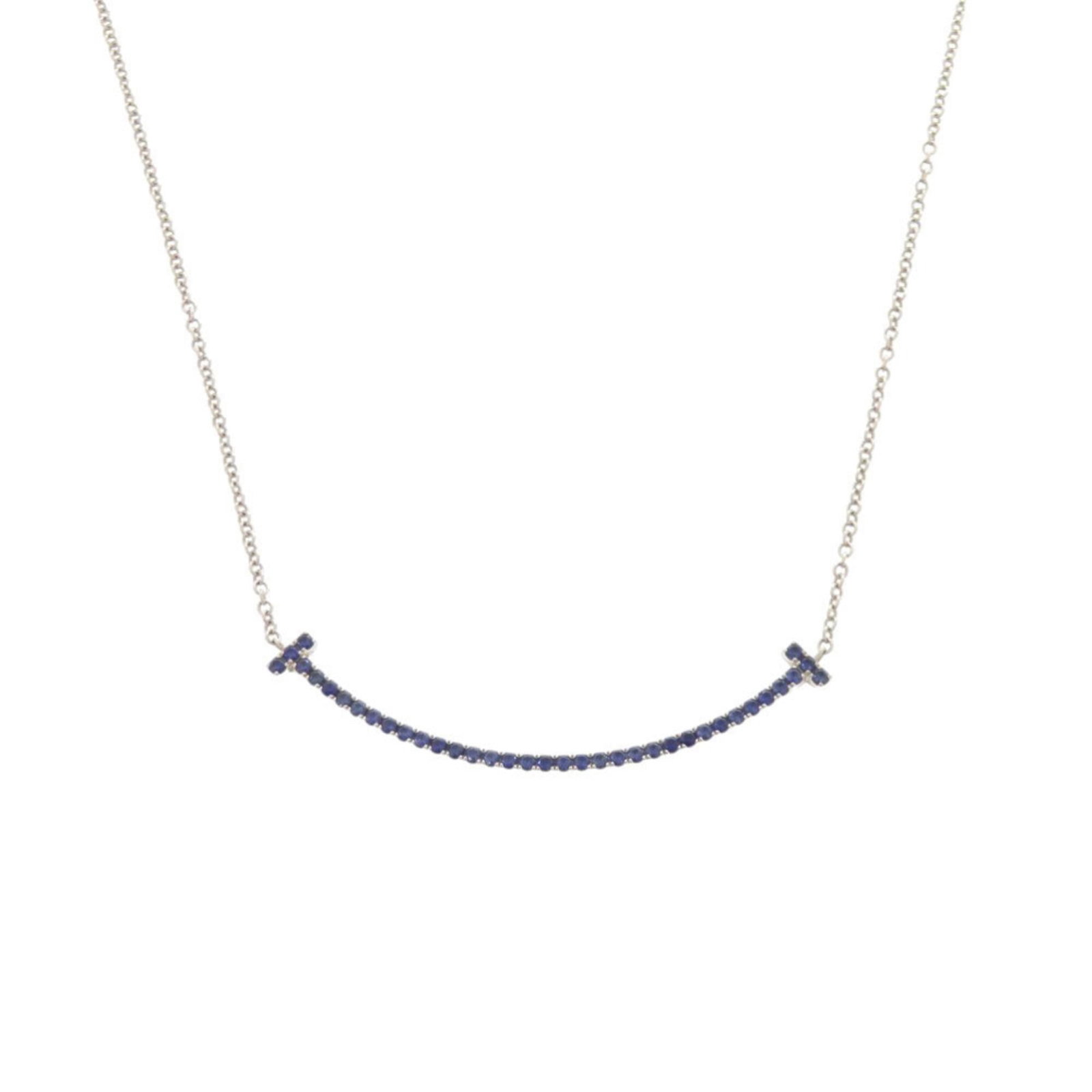 Tiffany T Smile Small Necklace In 18K White Gold With Sapphire And Gold 750 Excellent Condition: Tiffany T Smile Small Necklace In 18K White Gold With Sapphire And Gold 750 Excellent Condition 18K white gold necklace with sapphire and elegant design. The Tiffany & Co. brand adds a touch of