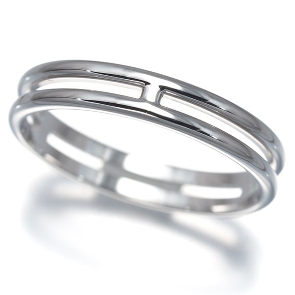 White gold Hermes ring Eu56 750 Ariane 18K wedding band: White gold Hermes ring Eu56 750 Ariane 18K wedding band White gold Hermes ring Eu56 750 Ariane features an 18k construction with a sleek, 3.7mm wide band. This elegant ring boasts the iconic Hermes de