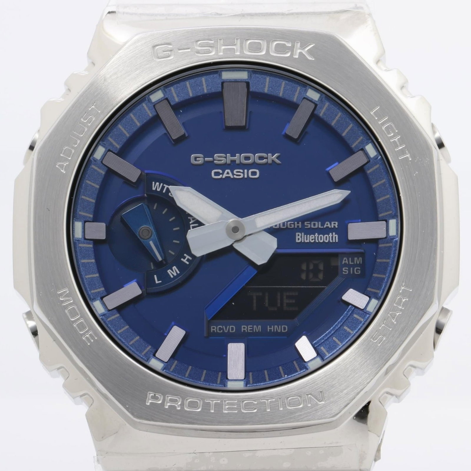 Wristwatch By Casio: Wristwatch By Casio Stainless steel case and band provide a durable and sleek design, while the blue dial adds a touch of style. Powered by Casio's solar technology for long-lasting battery life, this