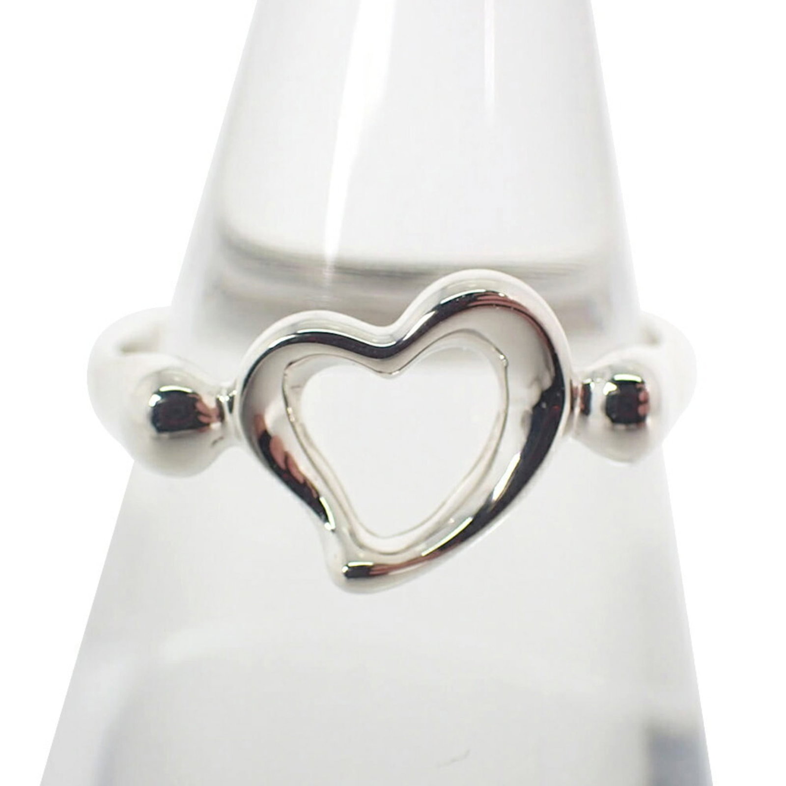 Sterling Silver Tiffany Band Ring 925: Sterling Silver Tiffany Band Ring 925 Sterling silver Tiffany band ring in size 5, crafted from high-quality sterling silver 925. This elegant band features the iconic Tiffany brand and boasts a