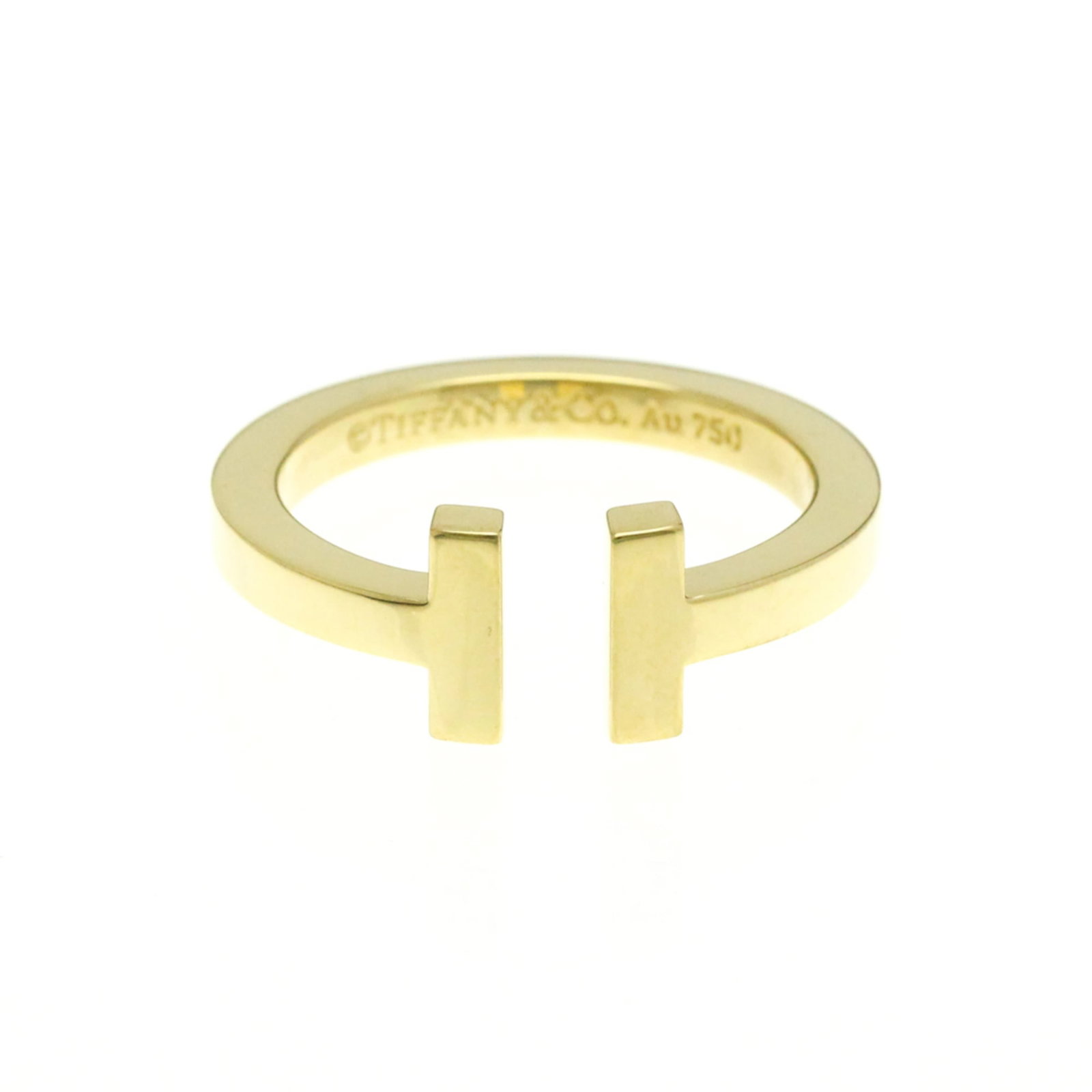 Tiffany gold ring band yellow: Tiffany gold ring band yellow Tiffany's iconic T-square ring band in yellow gold (18K) adds a touch of elegance to any outfit. This fashion-forward band features a slim, 2.5mm width and weighs just