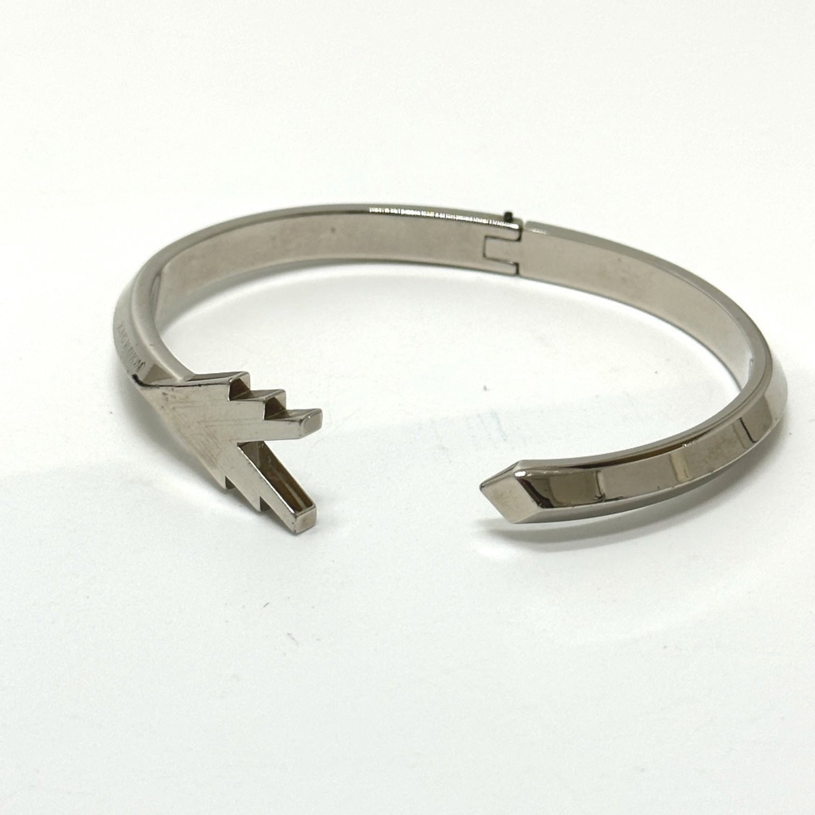 Louis Vuitton Charm Bracelet: Louis Vuitton Charm Bracelet The Louis Vuitton Charm Bracelet boasts a sleek silver finish and elegant design, making it a stylish accessory for any occasion. This gold plated charm bracelet comes