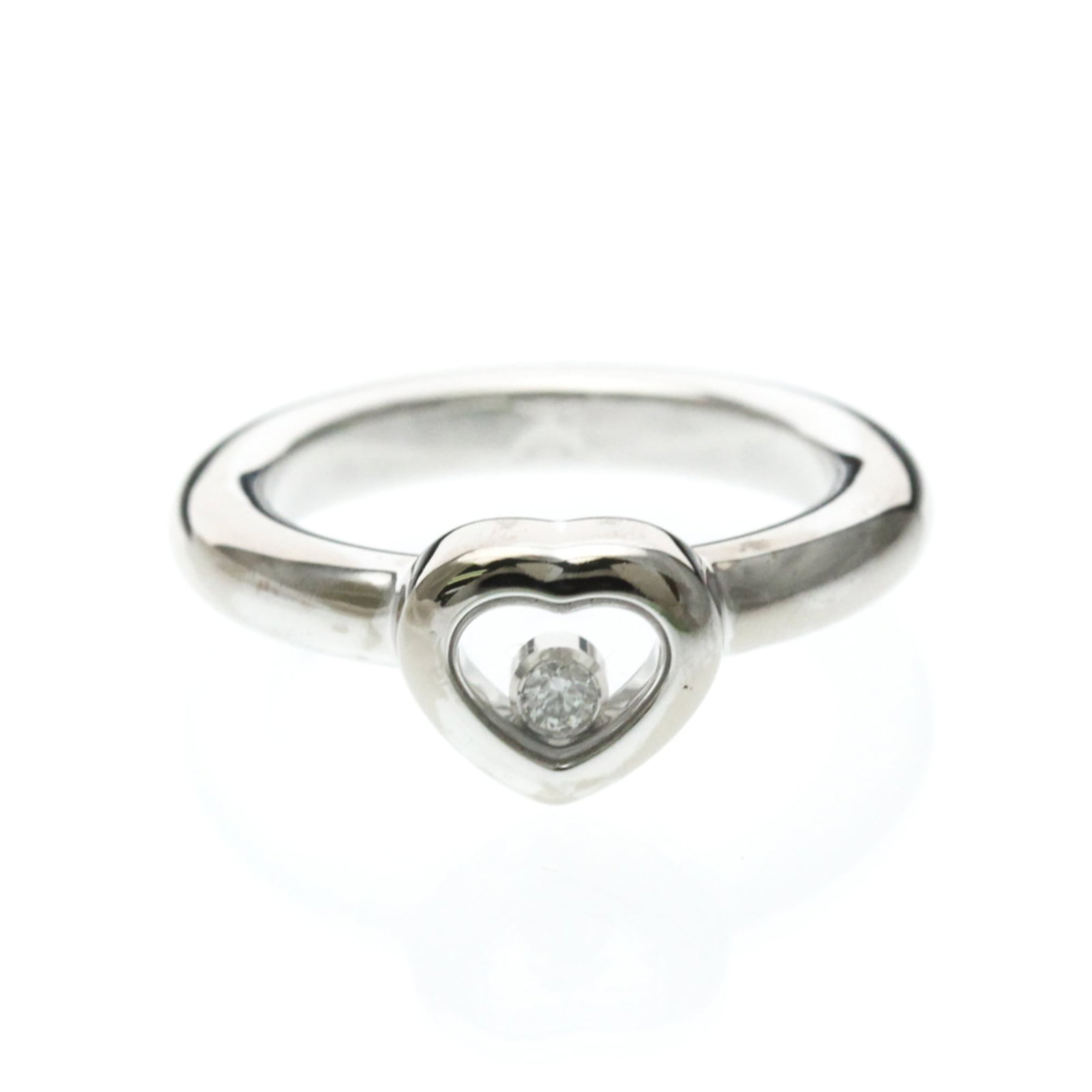 Chopard Band Ring White Gold (18K): Chopard Band Ring White Gold (18K) Chopard's Happy Diamond Ring is a sleek and sophisticated band ring featuring a diamond set in white gold. This 18K piece boasts a classic design with a silver