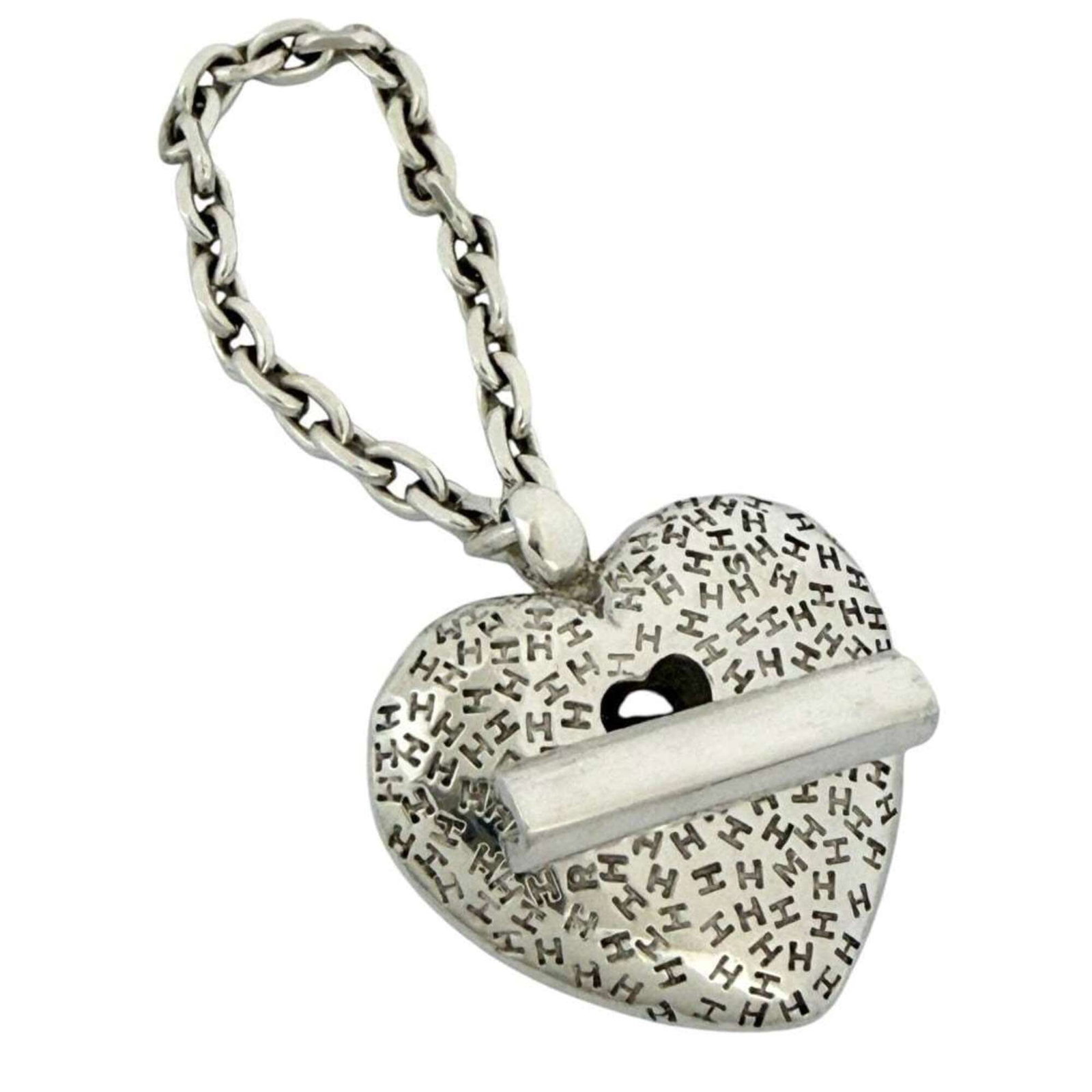 Hermes Handbag Charm Silver 925: Hermes Handbag Charm Silver 925 Silver 925 Handbag Charm from Hermes. This charm boasts a sleek, silver finish and bears the hallmark of Hermes' attention to detail. Made from high-quality sterling