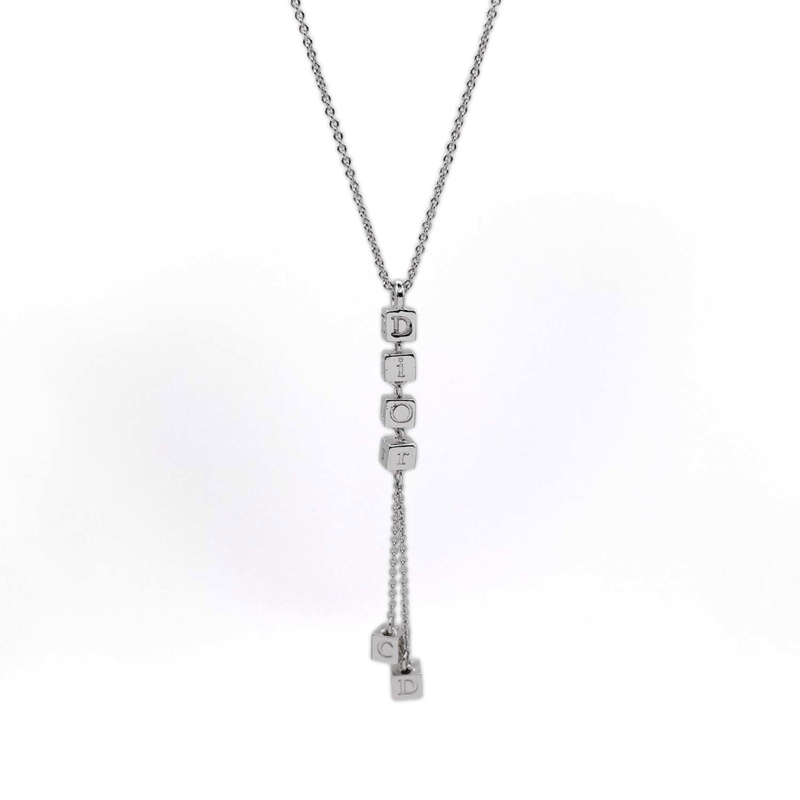 Women's silver rhinestone pendant necklace cube metal dice Christian Dior: Women's silver rhinestone pendant necklace cube metal dice Christian Dior Silver rhinestone pendant cube metal dice necklace from Christian Dior, featuring a unique combination of style and luxury.