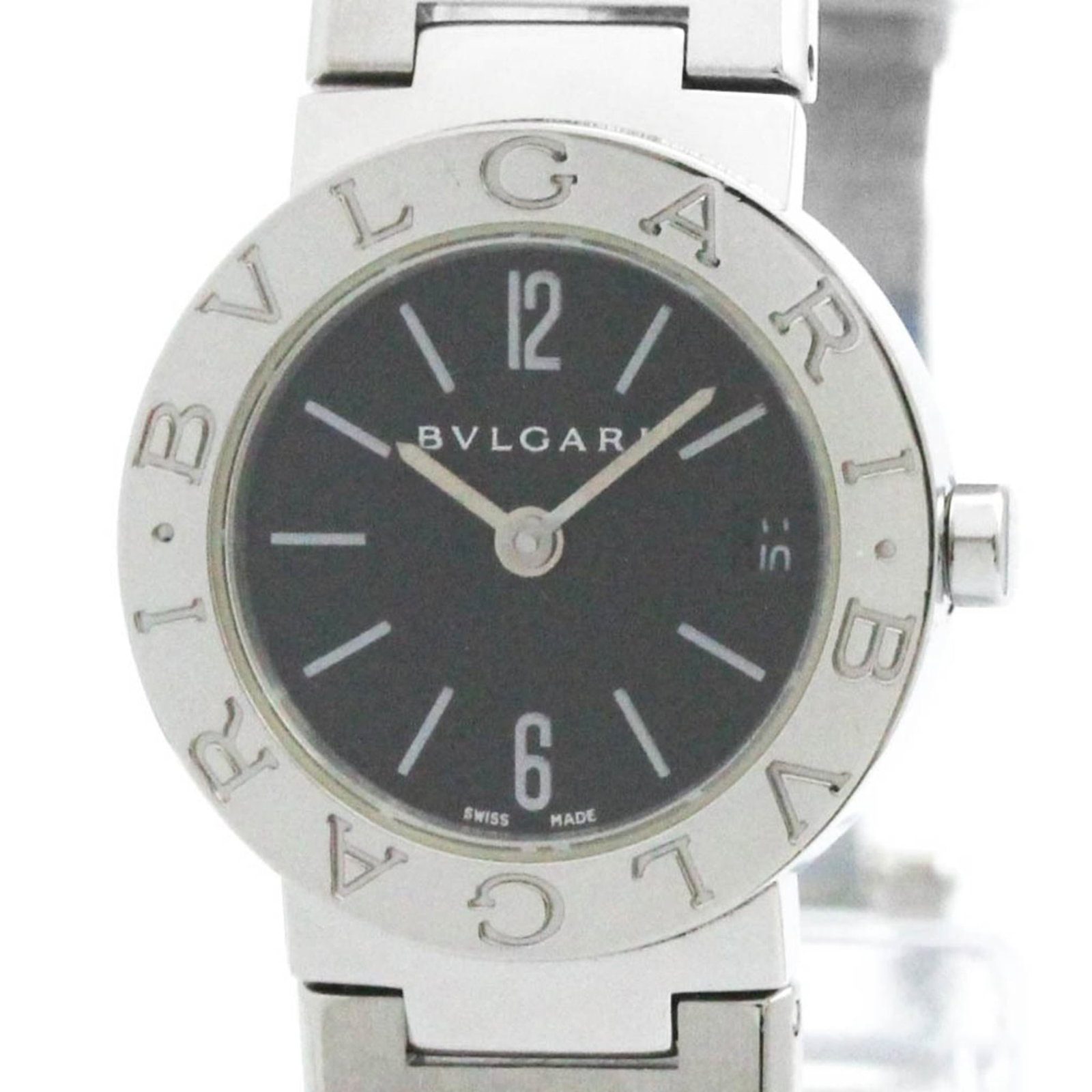 Bvlgari Wristwatch: Bvlgari Wristwatch Stainless steel case and band add an edgy touch to this sleek black Bvlgari wristwatch, featuring a quartz movement for reliable timekeeping. With its slim profile and 23mm