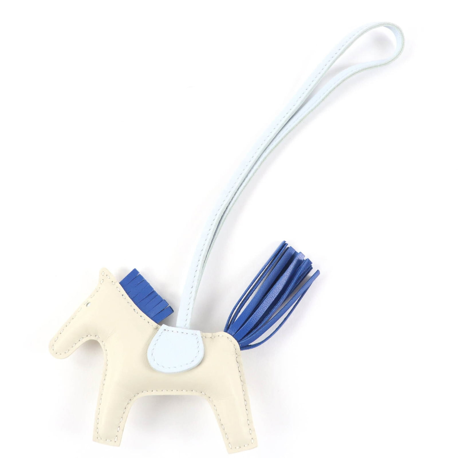 Hermes agneau handbag charm Milo: Hermes agneau handbag charm Milo Agneau Milo handbag charm from Hermes, crafted in France with high-quality agneau material. This charming piece measures 7.50mm x 13.00mm and features a striking blue