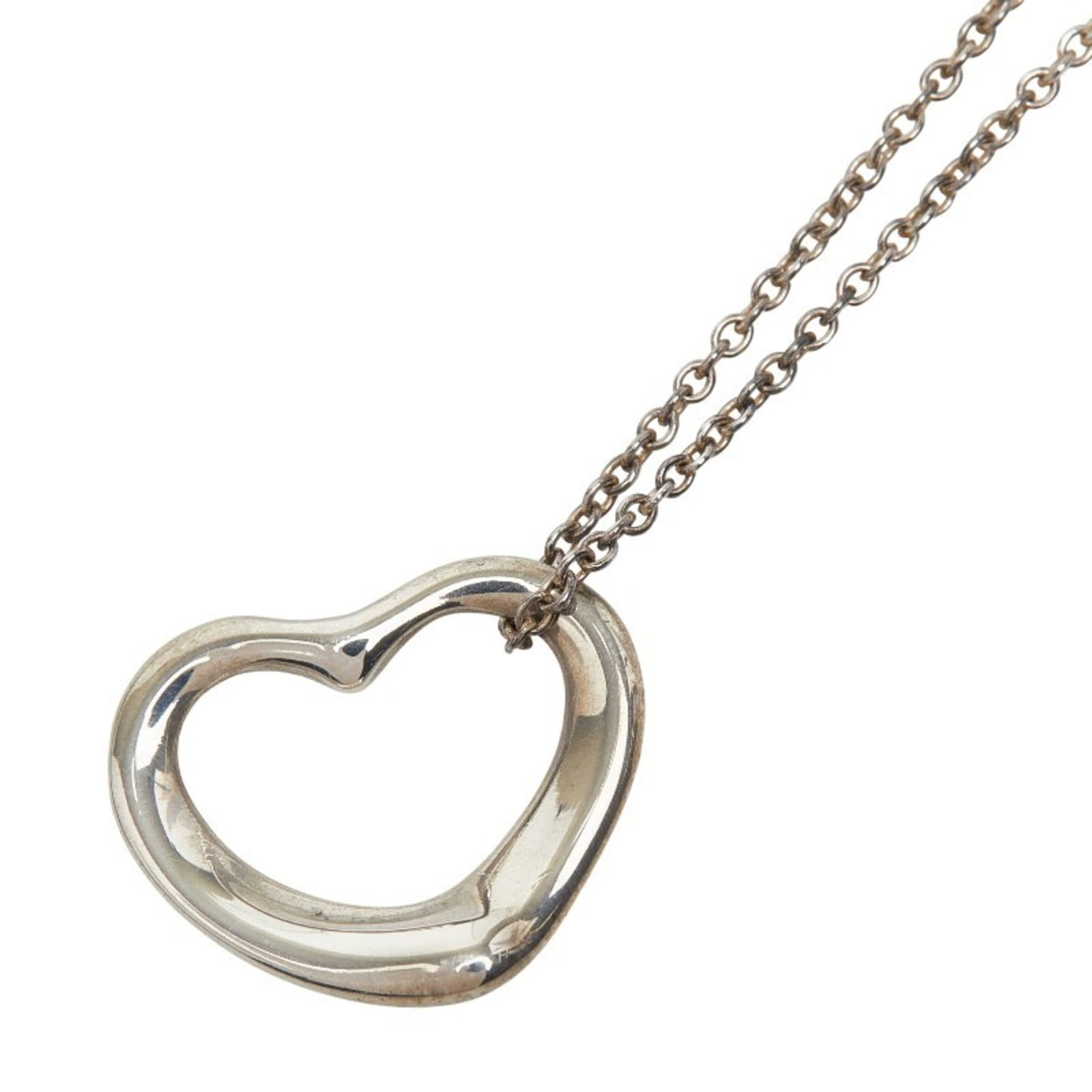 Tiffany & Co. Open Heart Necklace In 925 Sterling Silver For Women.: Tiffany & Co. Open Heart Necklace In 925 Sterling Silver For Women. Tiffany & Co.'s iconic Open Heart Necklace in sterling silver is a timeless classic. This elegant necklace features a beautifully