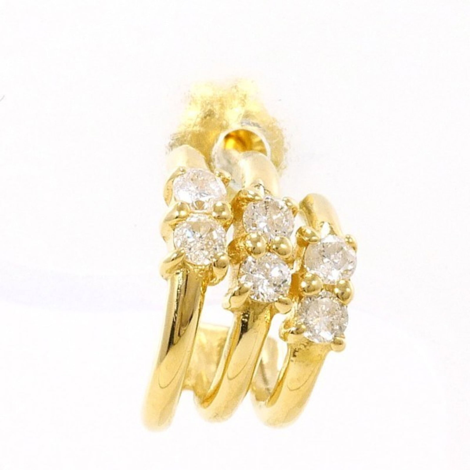 Yellow Gold Earrings 18K Unbranded: Yellow Gold Earrings 18K Unbranded Yellow gold earrings, crafted from 18K unbranded metal, boast a striking yellow gold hue. Each stud earring features a 0.10 carat diamond, adding a touch of