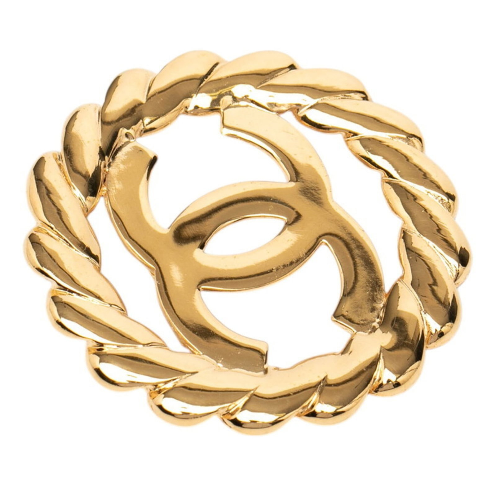 Chanel Brooch Gold Plating: Chanel Brooch Gold Plating Gold plating adds a touch of luxury to this Chanel brooch, measuring 5.7cm x 5.8cm in size. The item bears a signature and features gold plating material. It is a women's