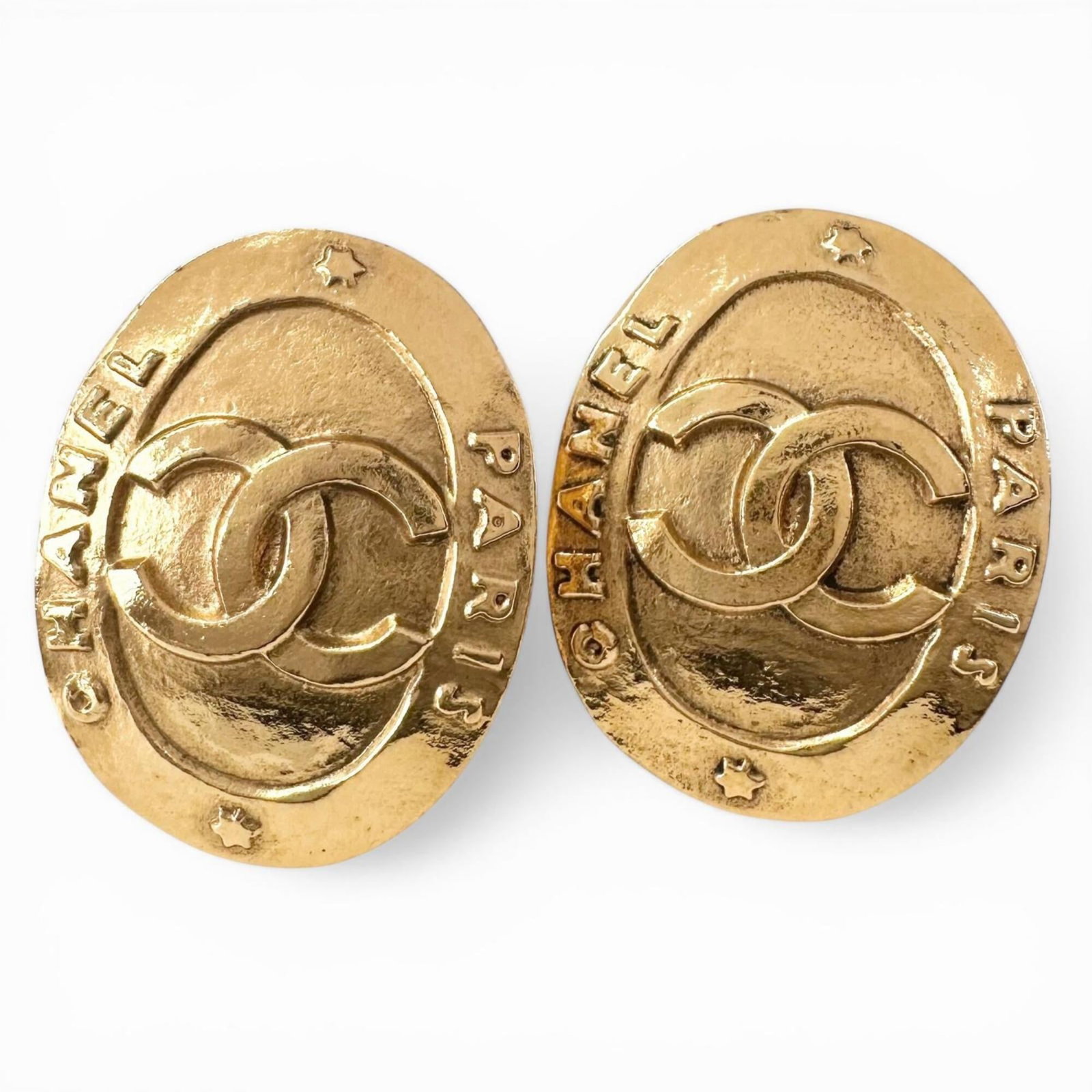 Clip earrings by Chanel: Clip earrings by Chanel Clip earrings by Chanel, crafted in gold and bearing the iconic French brand's signature style. Measuring just 2.30mm x 2.98mm, these delicate accessories add a touch of