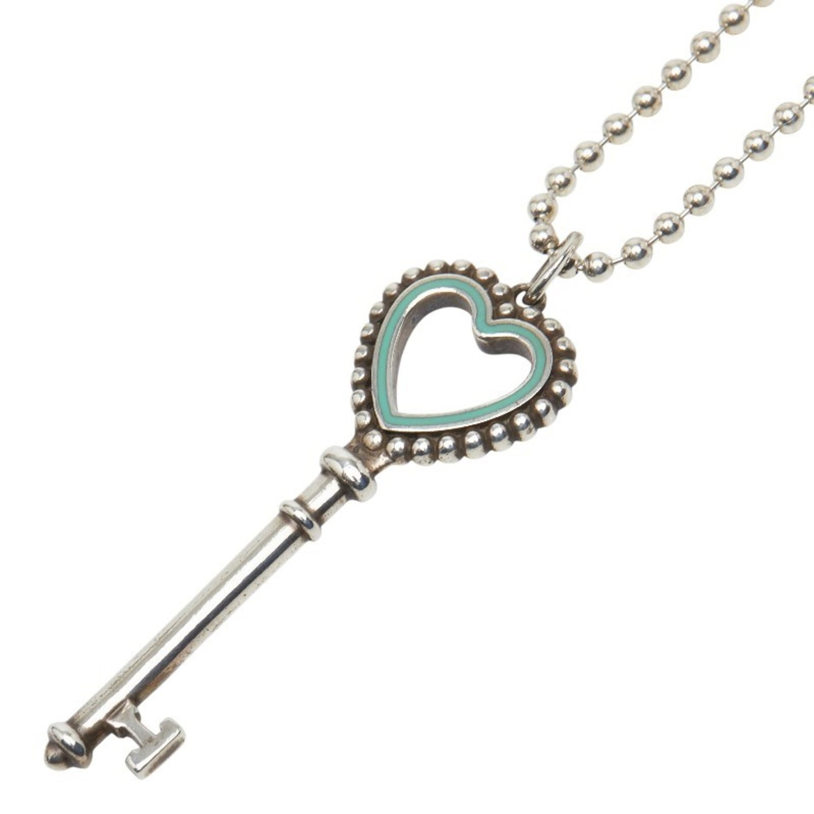 Tiffany & Co. Heart Key Necklace In 925 Sterling Silver For Women: Tiffany & Co. Heart Key Necklace In 925 Sterling Silver For Women Tiffany & Co. Heart Key Necklace in 925 Sterling Silver is a beautiful piece featuring a delicate heart-shaped key pendant suspended f