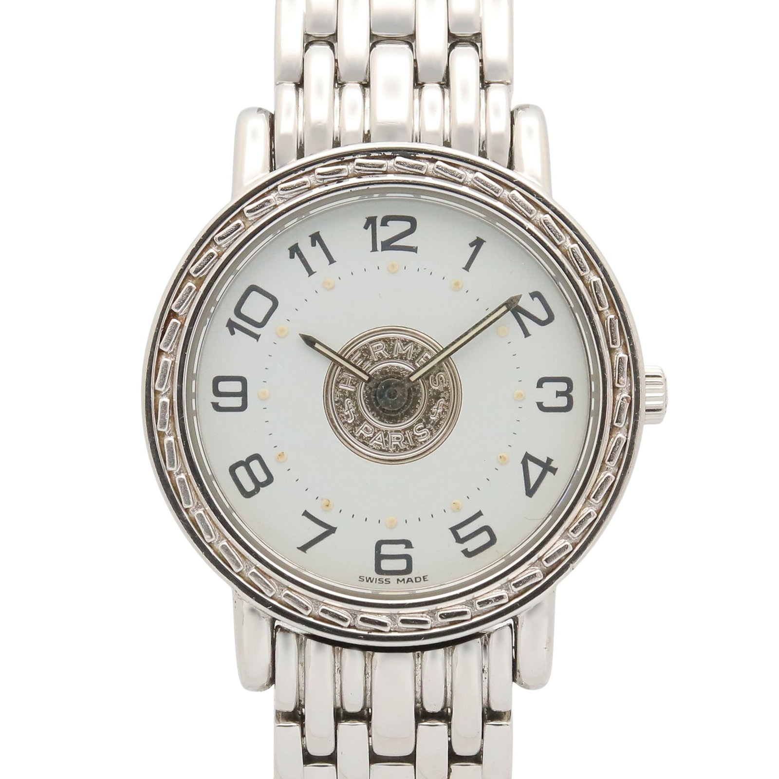 Hermes Wristwatch: Hermes Wristwatch Stainless steel case and band, white dial, quartz movement, and a sleek 24.5mm design make this Hermes wristwatch a stylish accessory for everyday wear. Its durable construction