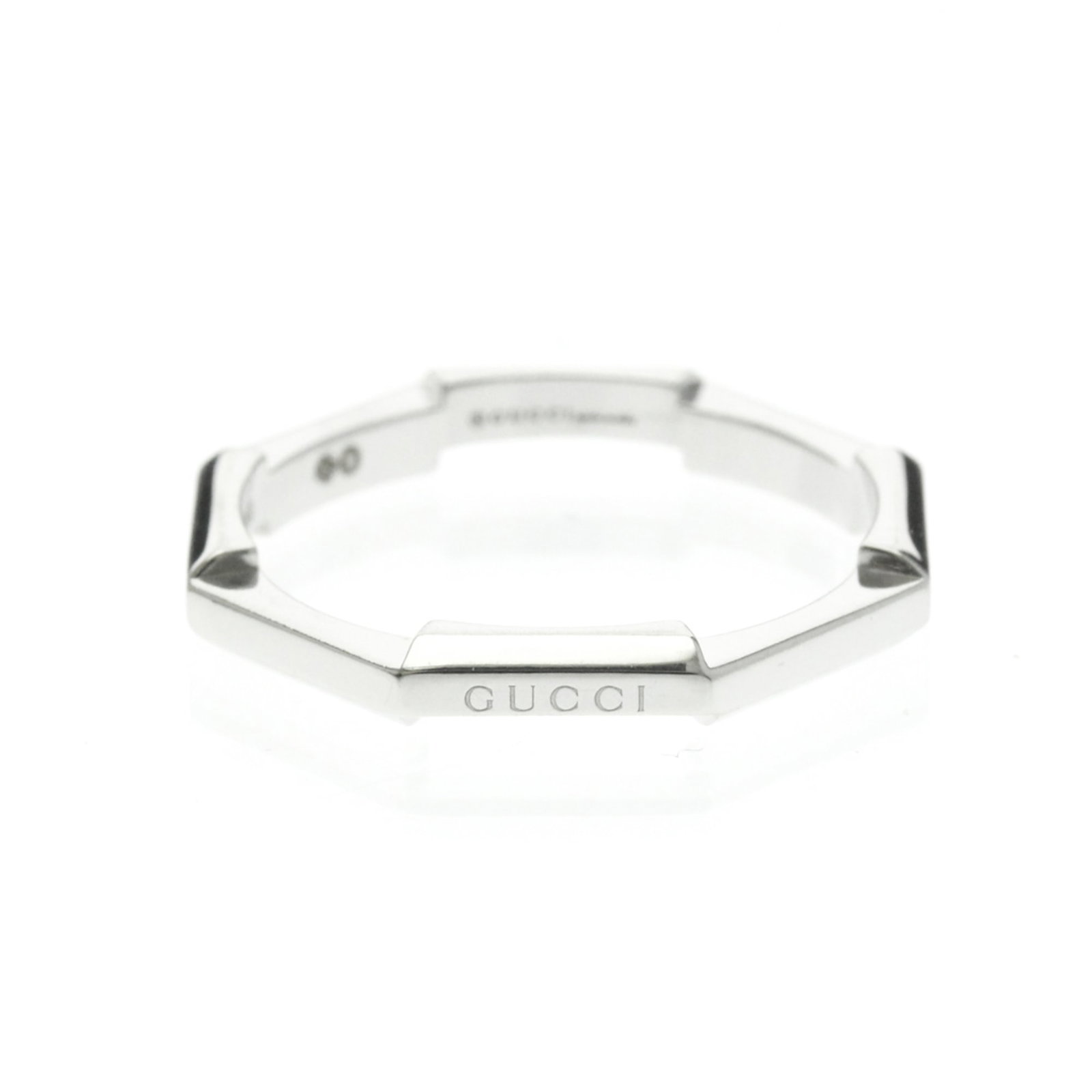White Gold Gucci Band Ring: White Gold Gucci Band Ring White gold Gucci band ring in 18K purity, featuring a sleek and modern design with a width of 2.2mm. This stylish accessory boasts a total weight of 140g, making it a