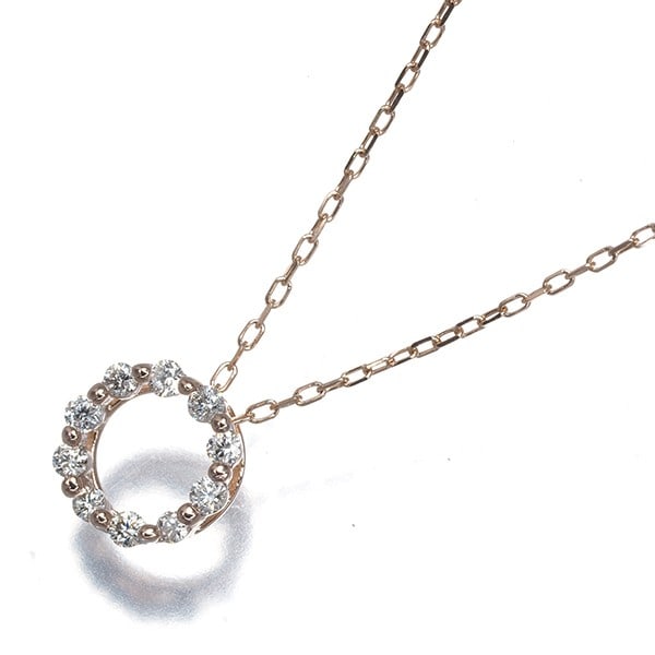 Circle necklace in rose gold 10k diamond 0.10ct: Circle necklace in rose gold 10k diamond 0.10ct Rose gold pendant necklace featuring a 0.10ct natural diamond, carefully crafted in 10k rose gold metal purity. The elegant design showcases the beauty