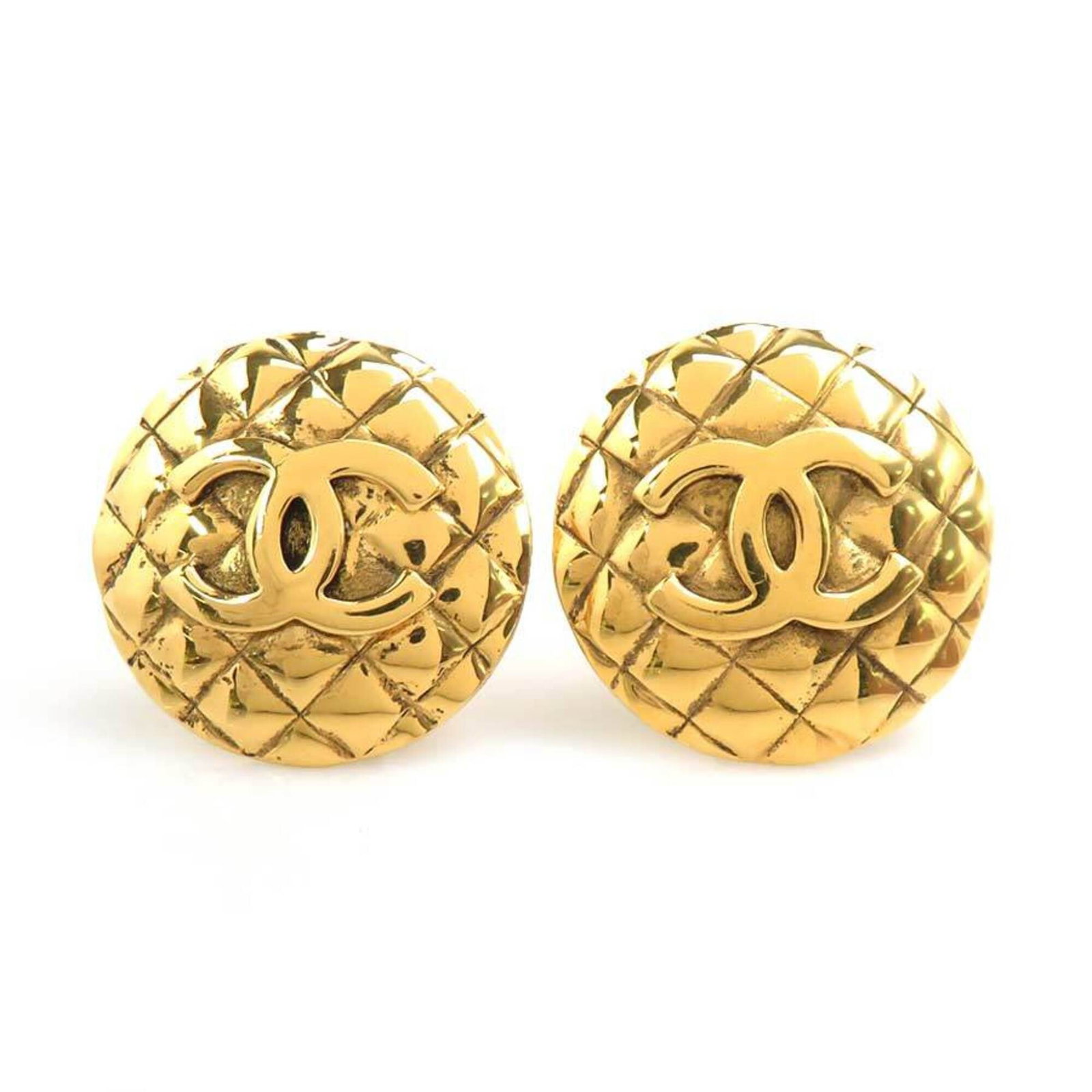 Metal clip earrings by Chanel: Metal clip earrings by Chanel Metal clip earrings by Chanel, crafted from gold metal. A classic design element, these clip earrings are made from high-quality metal and feature a timeless gold