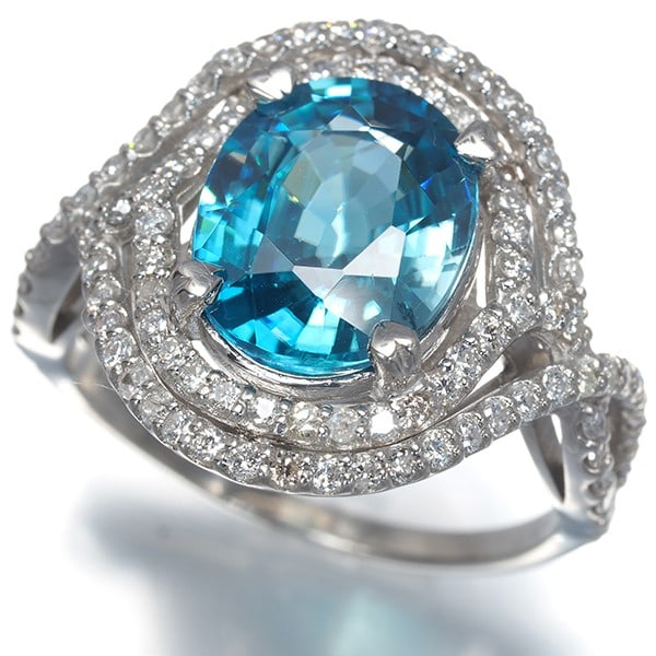 Blue Zircon 5.292Ct Diamond 0.90Ct Ring 900 Platinum: Blue Zircon 5.292Ct Diamond 0.90Ct Ring 900 Platinum 900 Platinum Blue Zircon Diamond Ring features a stunning blue zircon stone weighing approximately 5.292ct, paired with a total of 0.90ct diamond, 