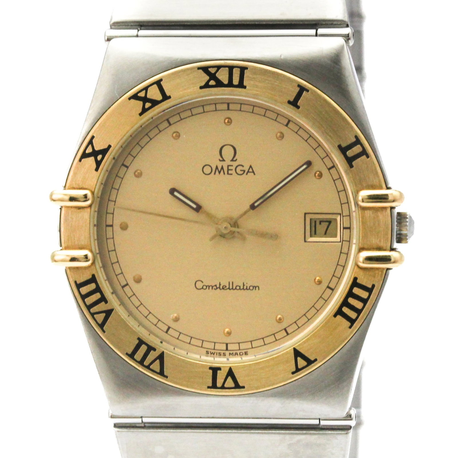 Wristwatch of Omega: Wristwatch of Omega Stainless steel and yellow gold (18K) combine in the Omega Constellation watch, available in a sleek dress/formal style. This quartz movement features date functionality and sits