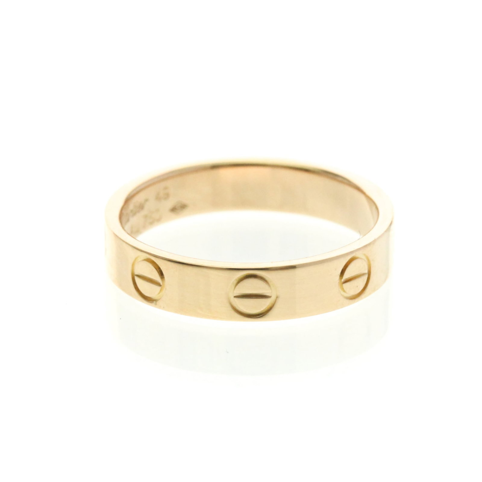 Pink Gold Ring Band Cartier: Pink Gold Ring Band Cartier Pink Gold Ring Band Cartier features a striking pink gold design, crafted from 18K metal. This fashion band ring boasts a slender width of 3.6mm and weighs 3.1g, making it