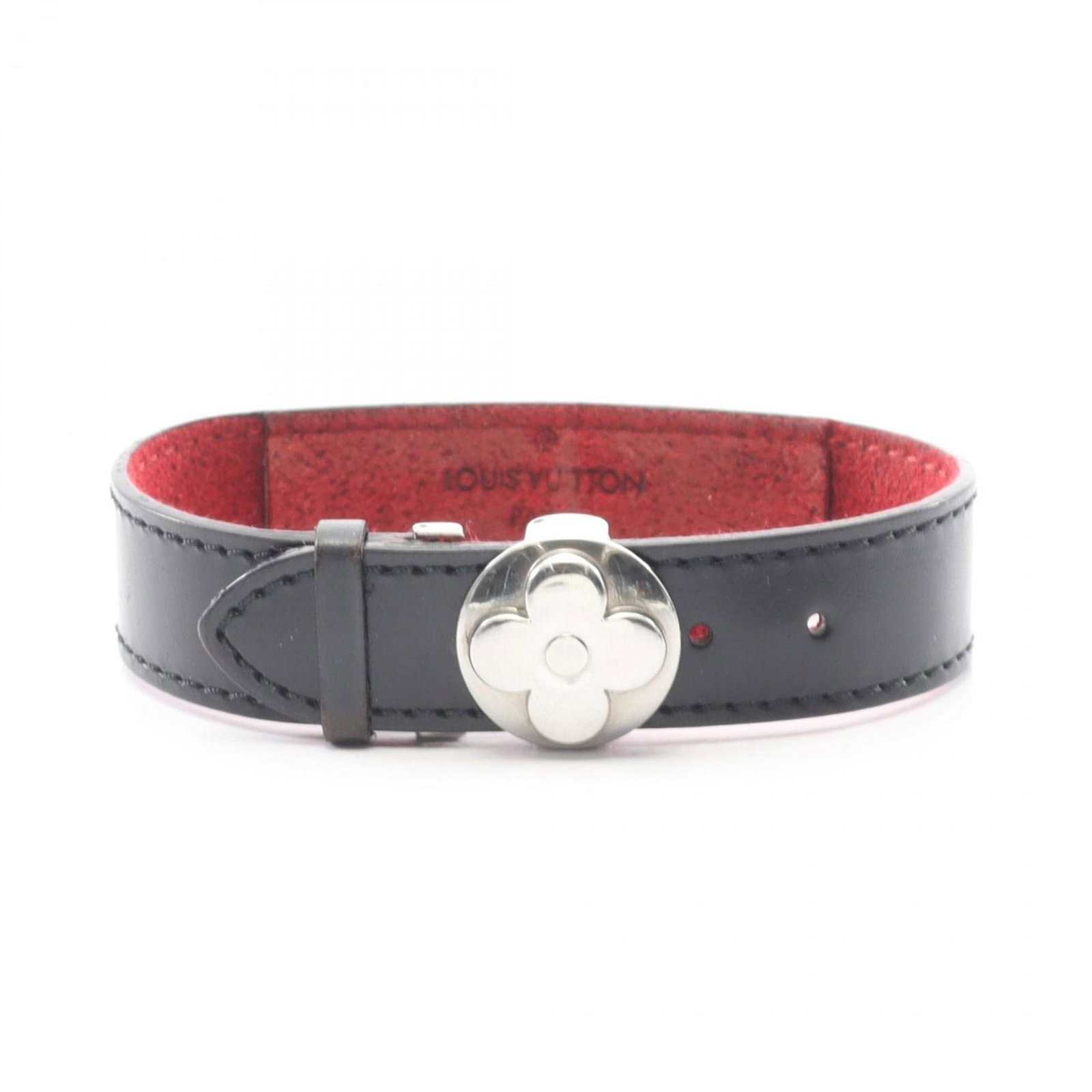 Stainless steel leather charm bracelet by Louis Vuitton: Stainless steel leather charm bracelet by Louis Vuitton Stainless steel and black leather come together in a sleek Louis Vuitton charm bracelet, featuring a durable stainless steel component. The clas