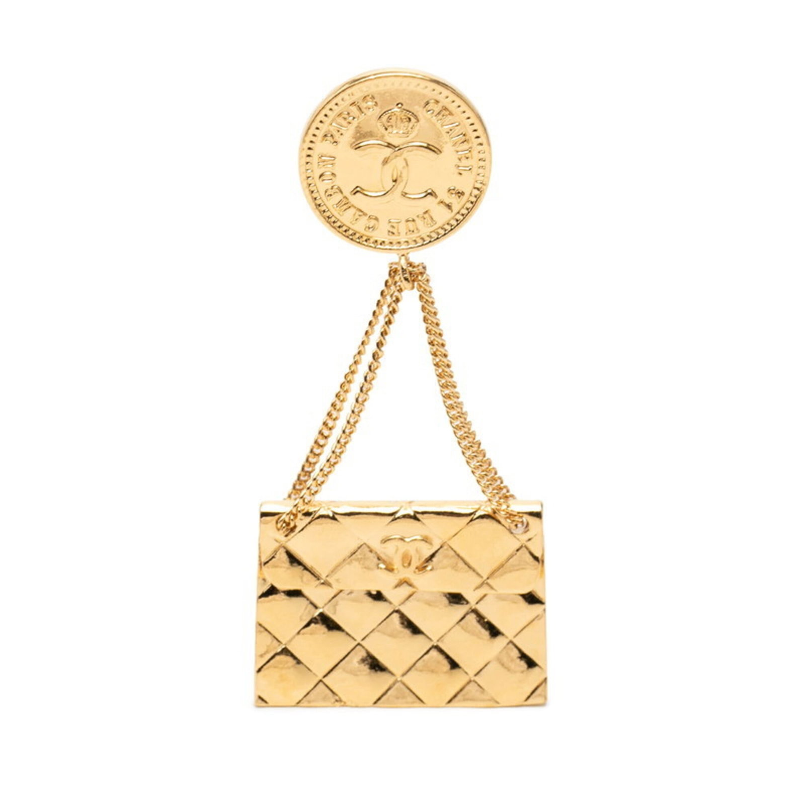 Brooch Chanel: Brooch Chanel The Matelasse brooch from Chanel boasts a striking gold finish, measuring 7.88cm x 3.46cm in size. This elegant piece features the signature style of the iconic brand, with its