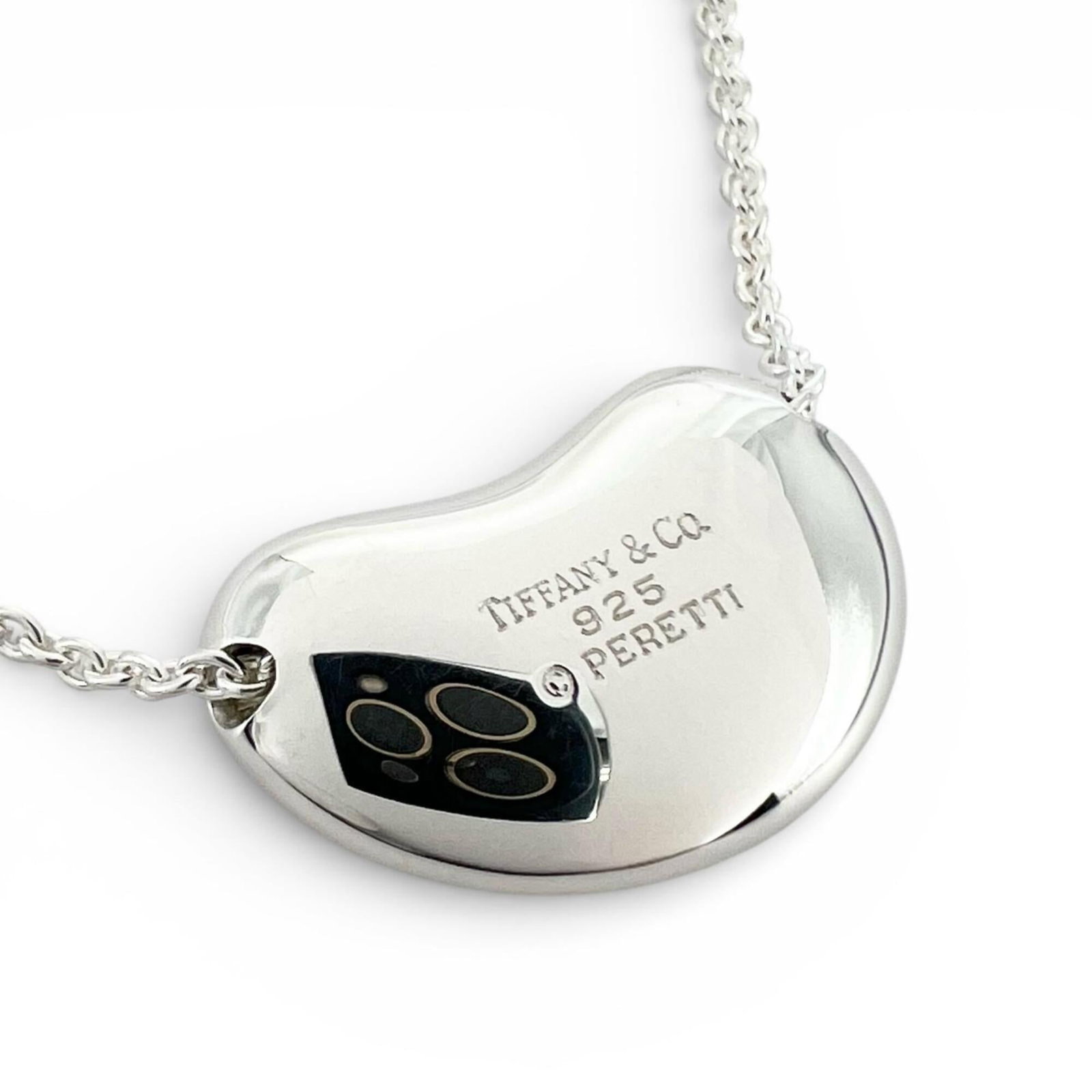 Elsa Peretti Sterling Silver 925 Women's Bean Necklace: Elsa Peretti Sterling Silver 925 Women's Bean Necklace Elsa Peretti's sterling silver 925 bean necklace boasts a sleek, modern design with a 12mm x 20mm pendant. The 40 cm / 15.74'' chain provides a