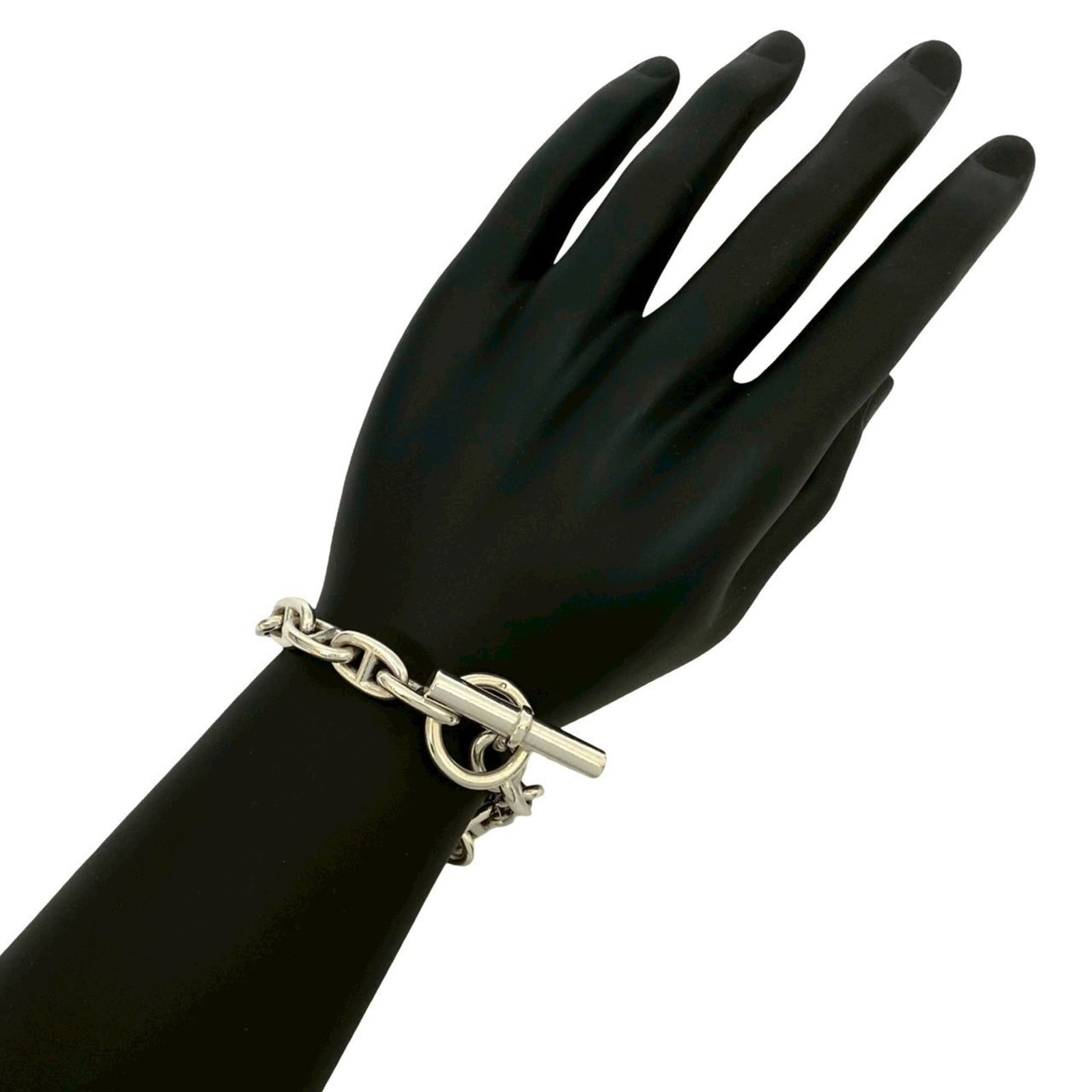 Charm Bracelet Silver 925 by Hermes: Charm Bracelet Silver 925 by Hermes Silver 925 Charm Bracelet by Hermes measures 19cm in length, showcasing its sleek design. Made from high-quality silver, this charm bracelet offers a touch of elega