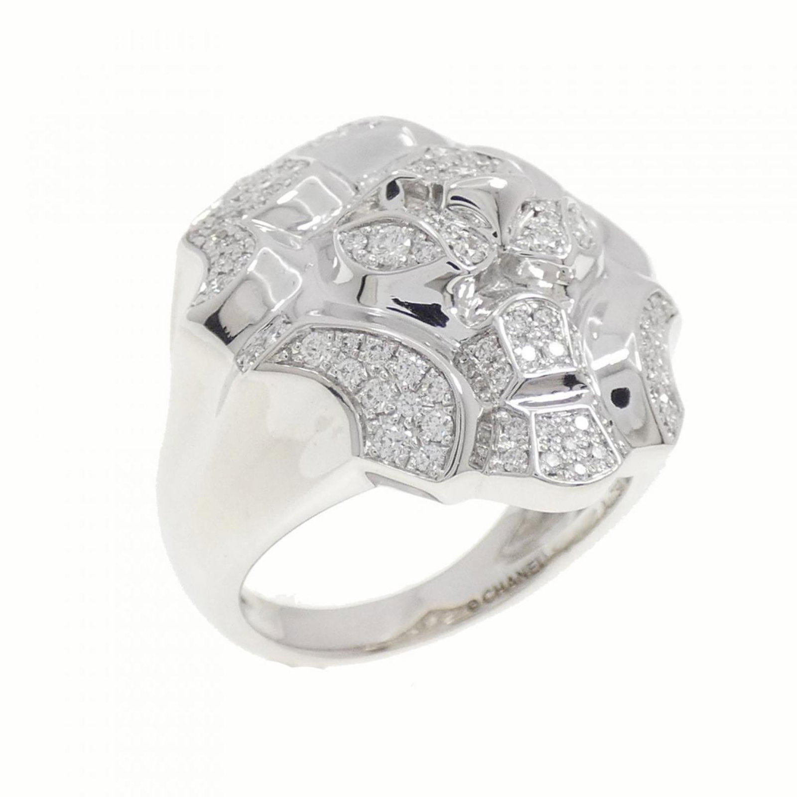 Chanel Band Ring White Gold (18K): Chanel Band Ring White Gold (18K) White gold band ring from Chanel, featuring a diamond stone and measuring 24.2mm in width. This 18K piece weighs 16.6g and fits US size 7 and JP size 14. The ring