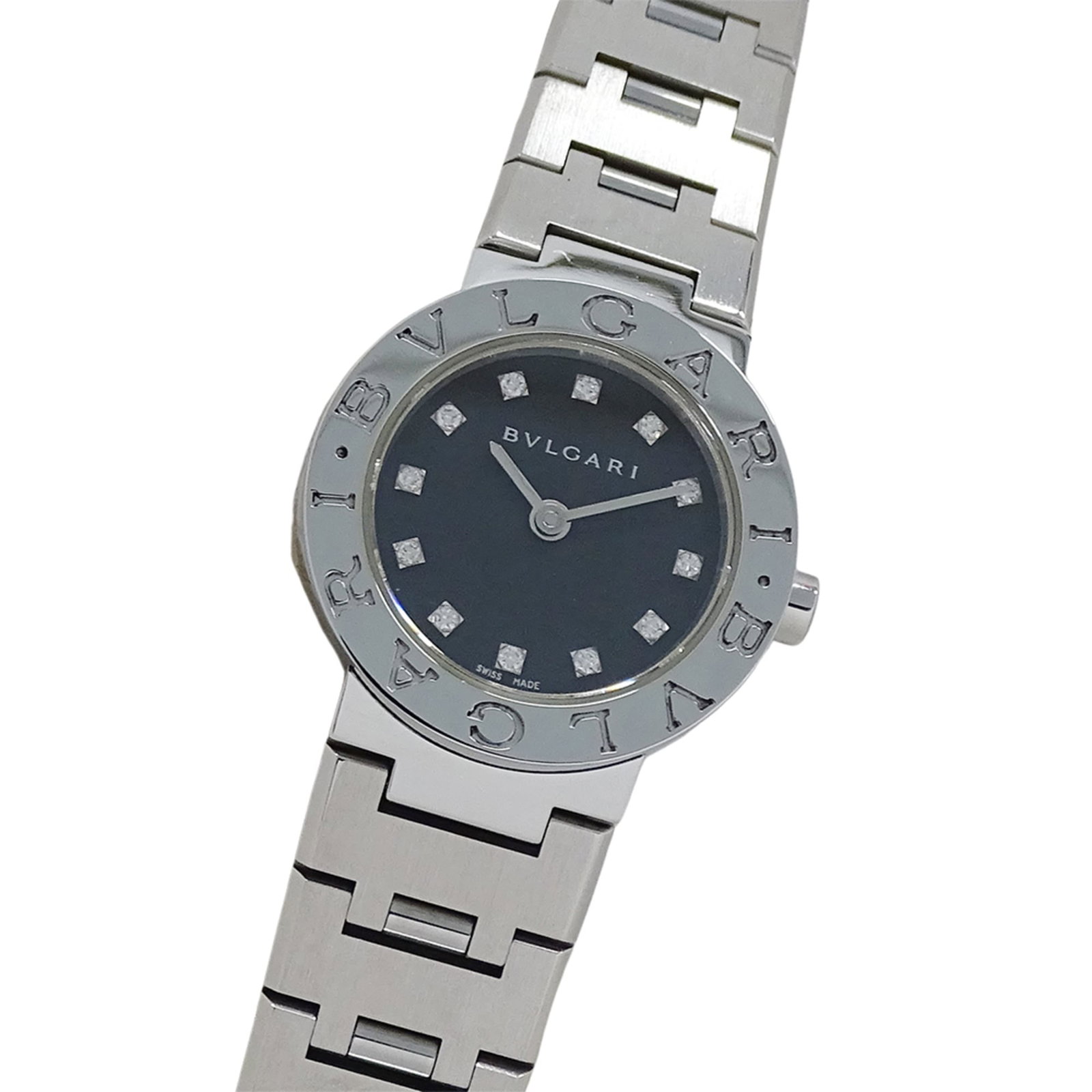 Bvlgari Wristwatch: Bvlgari Wristwatch Stainless steel case and band add a sleek touch to this Bvlgari quartz wristwatch, featuring a black dial. With its compact size at 23mm, it's designed for women who appreciate