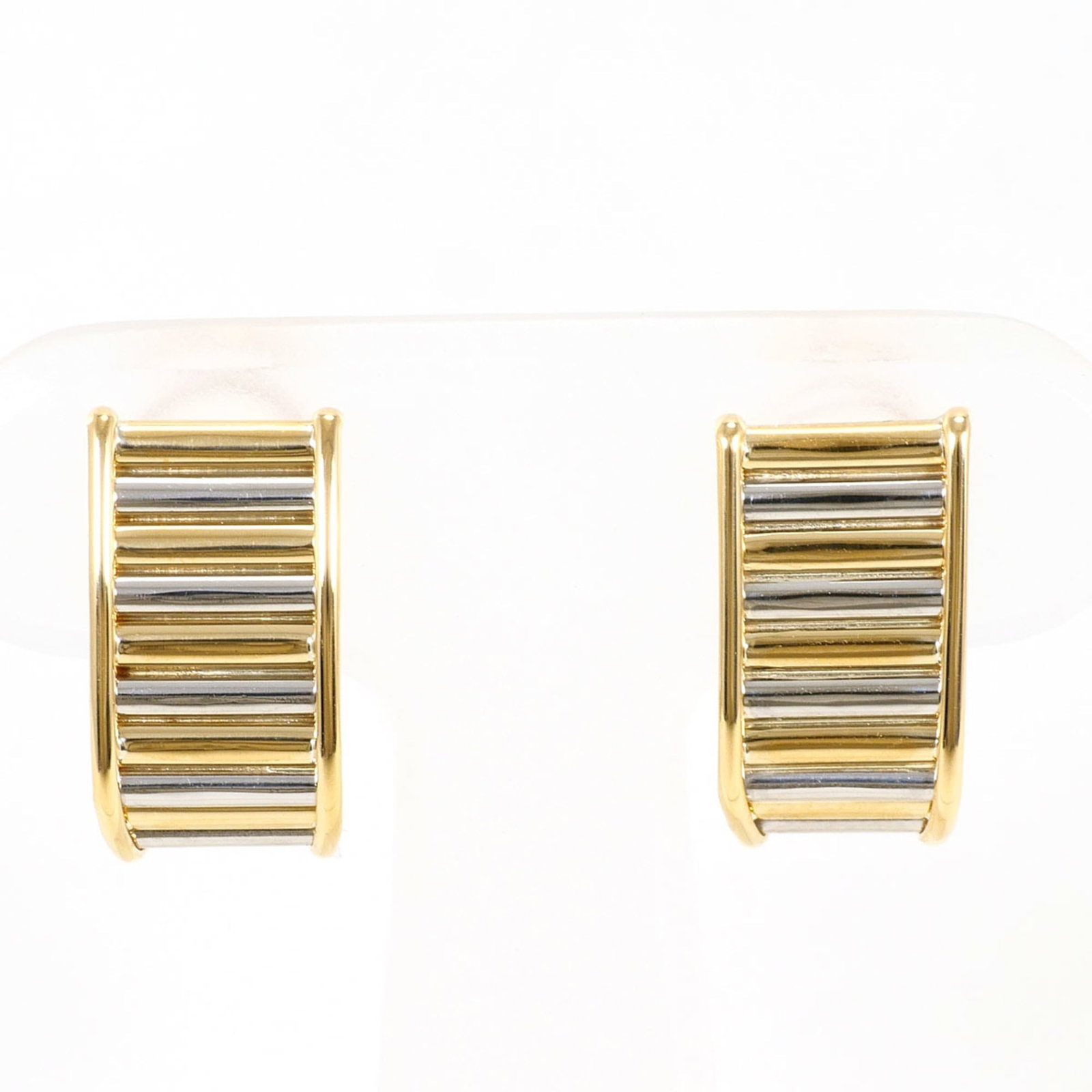 Unbranded Hoop Earrings Platinum Yellow Gold (18K): Unbranded Hoop Earrings Platinum Yellow Gold (18K) Platinum and yellow gold (18K) combine in these elegant hoop earrings, crafted from high-quality materials. Weighing in at 3.3g, each earring boasts
