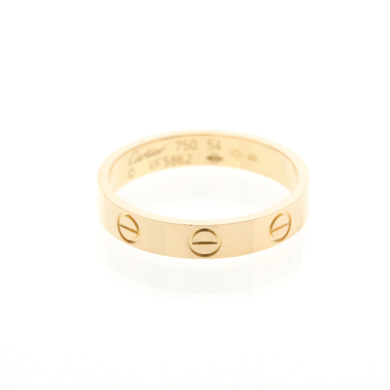 Pink Gold Ring Band Cartier: Pink Gold Ring Band Cartier Pink gold band ring from Cartier, featuring a classic design with a subtle pink hue. Made from 18K pink gold, this elegant ring boasts a sleek and sophisticated style that