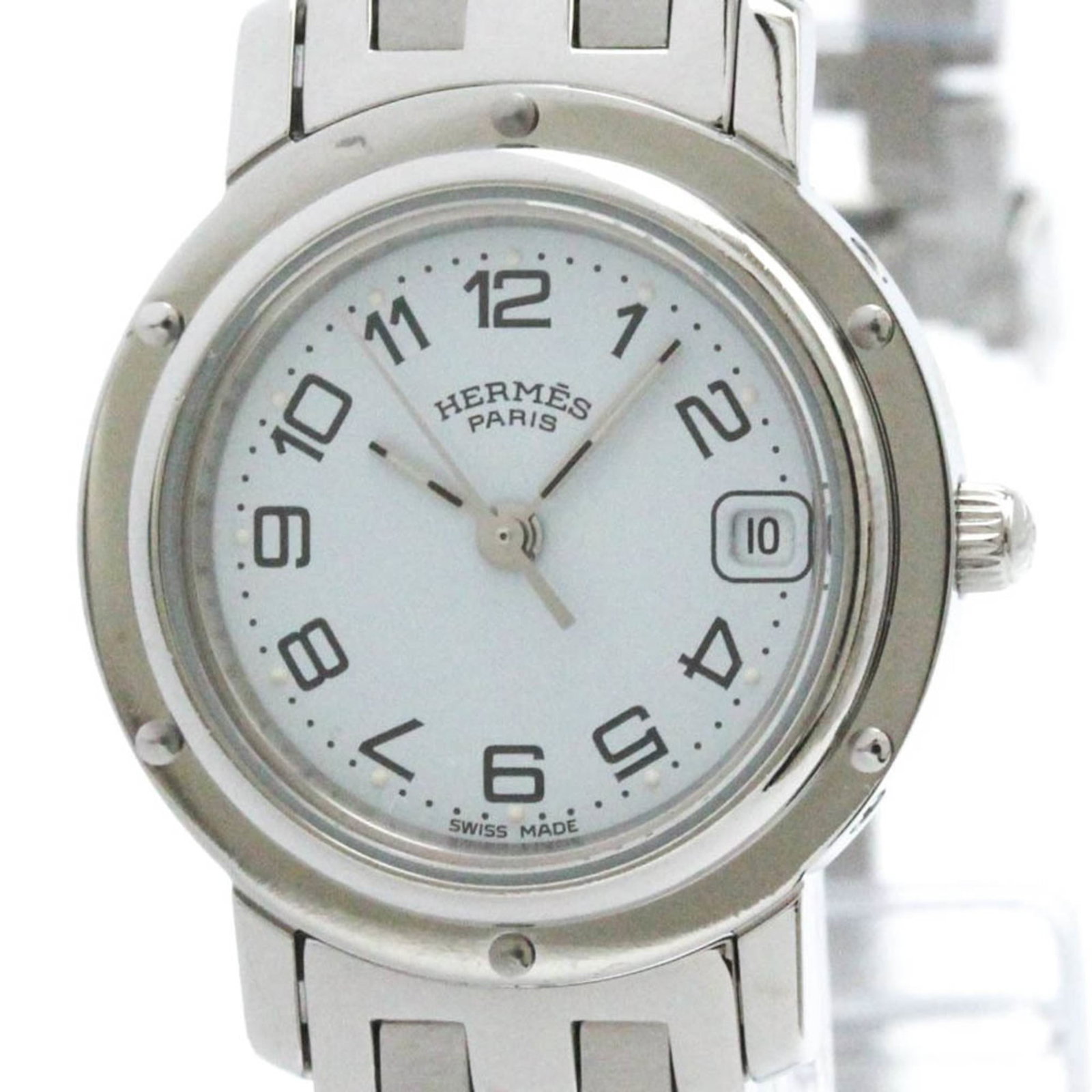 Hermes Wristwatch: Hermes Wristwatch Stainless steel case and band, the Hermes Clipper Wristwatch boasts a sleek white dial. With its quartz movement and date function, this dress-formal timepiece is designed for