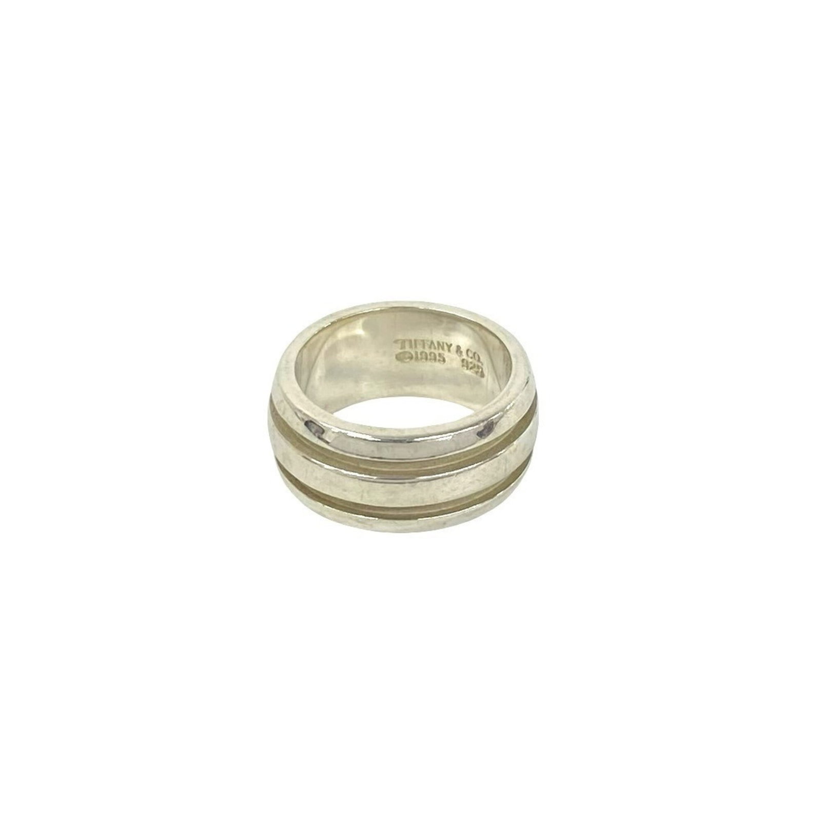 Silver 925 Tiffany Band Ring: Silver 925 Tiffany Band Ring Silver 925 Tiffany Band Ring, available in US size 5 and Japanese size 9. This elegant band ring features sterling silver material and a classic design that suits women's