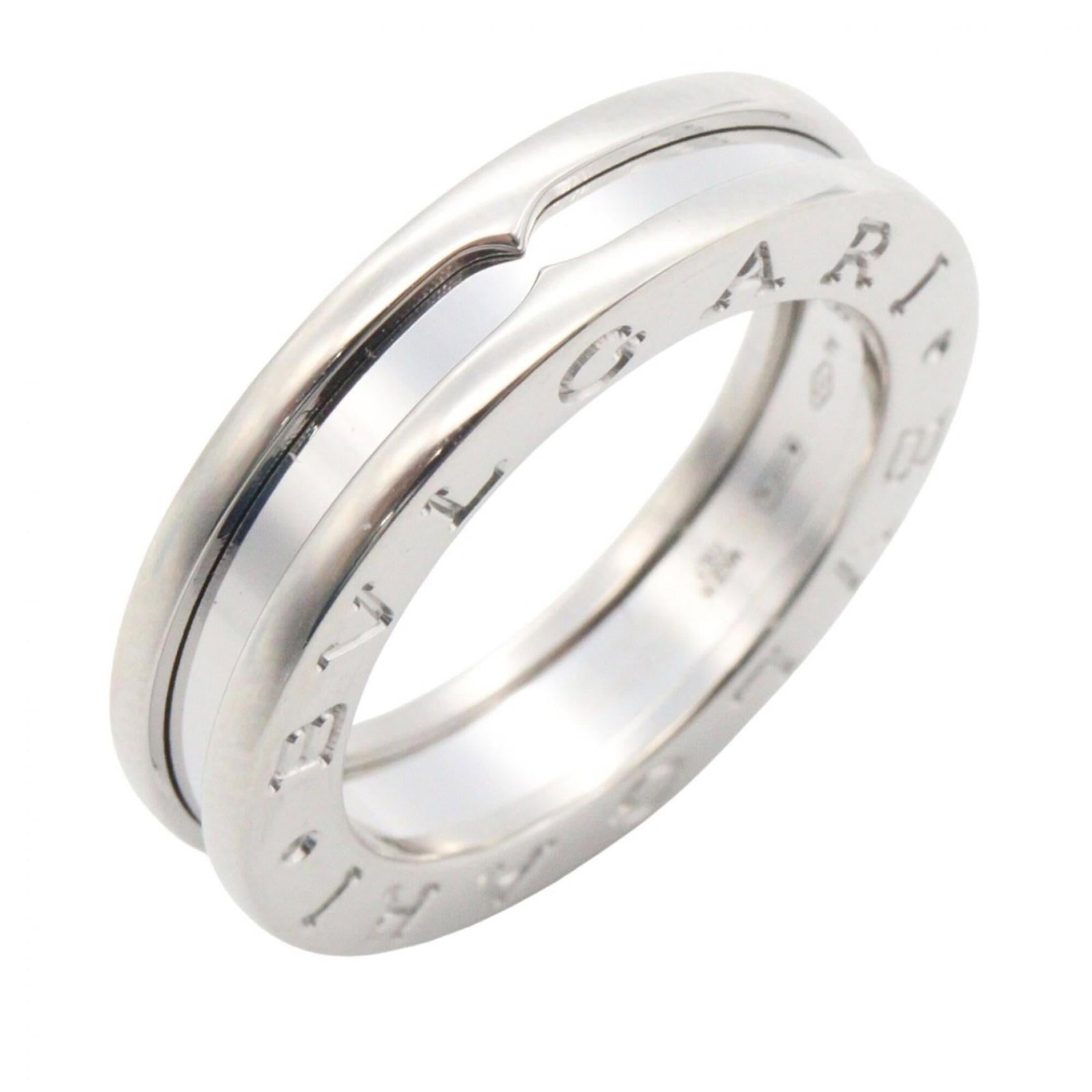 Bvlgari Band Ring White Gold (18K): Bvlgari Band Ring White Gold (18K) Bvlgari Band Ring White Gold (18K) is a sleek and sophisticated band ring crafted from high-quality white gold (18K). This elegant piece features a classic design
